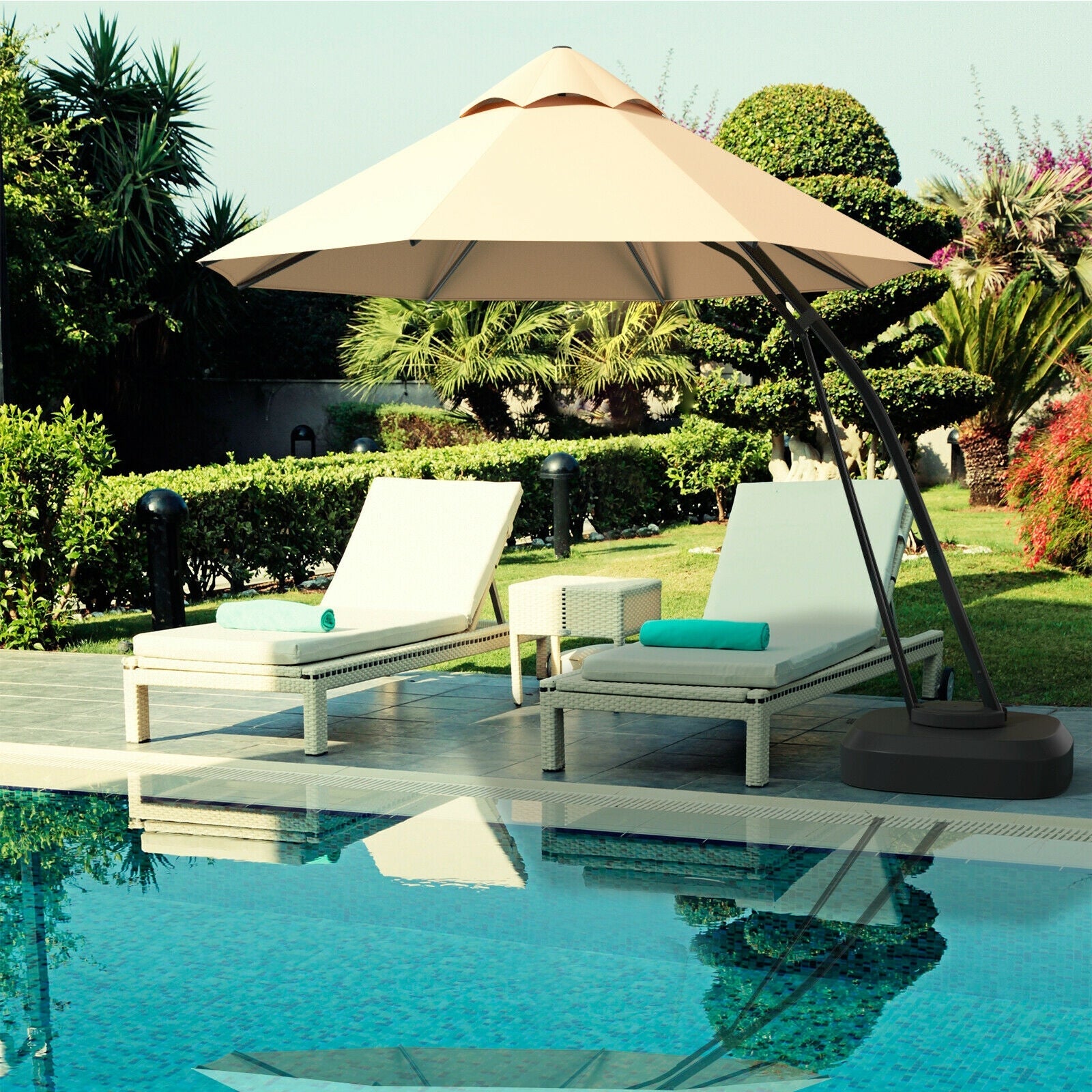 11 Feet Outdoor Cantilever Hanging Umbrella with Base and Wheels-Beige over poolside loungers in outdoor setting
