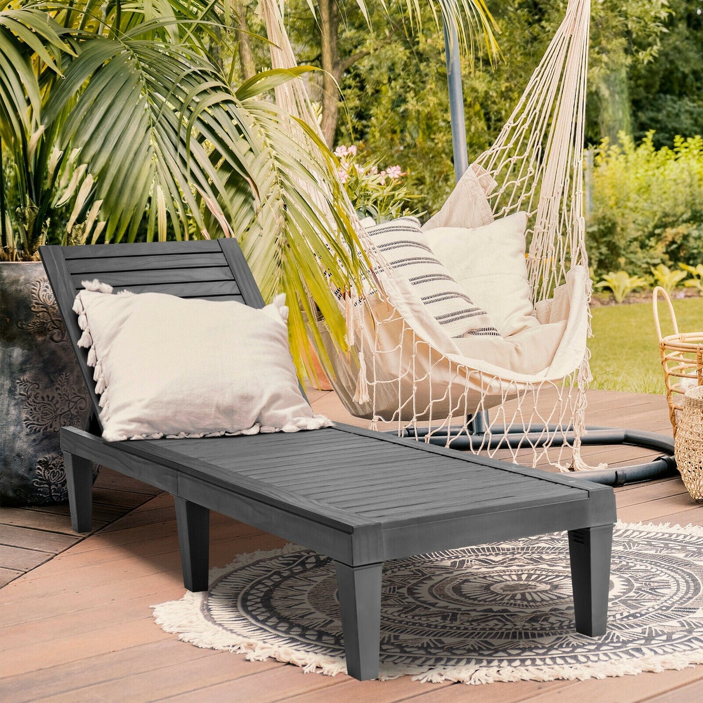 Outdoor Recliner Chair with 5-Position Adjustable Backrest-Black on patio with hammock and plants