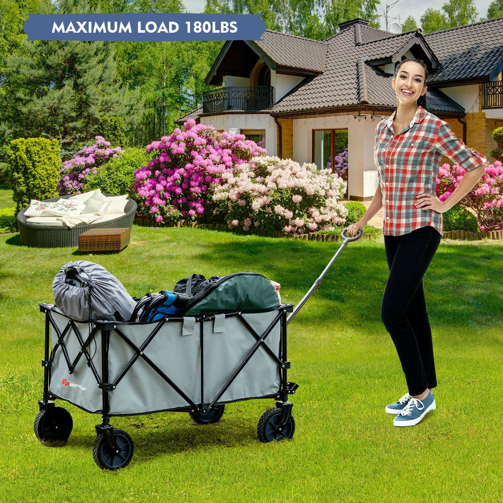 Outdoor Folding Wagon Cart with Adjustable Handle and Universal Wheels-Gray in use, showing capacity and versatility on grass