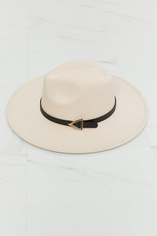 Savannah Sunset Hat - Beige Fedora with black belt and triangle-shaped gold buckle on marble surface