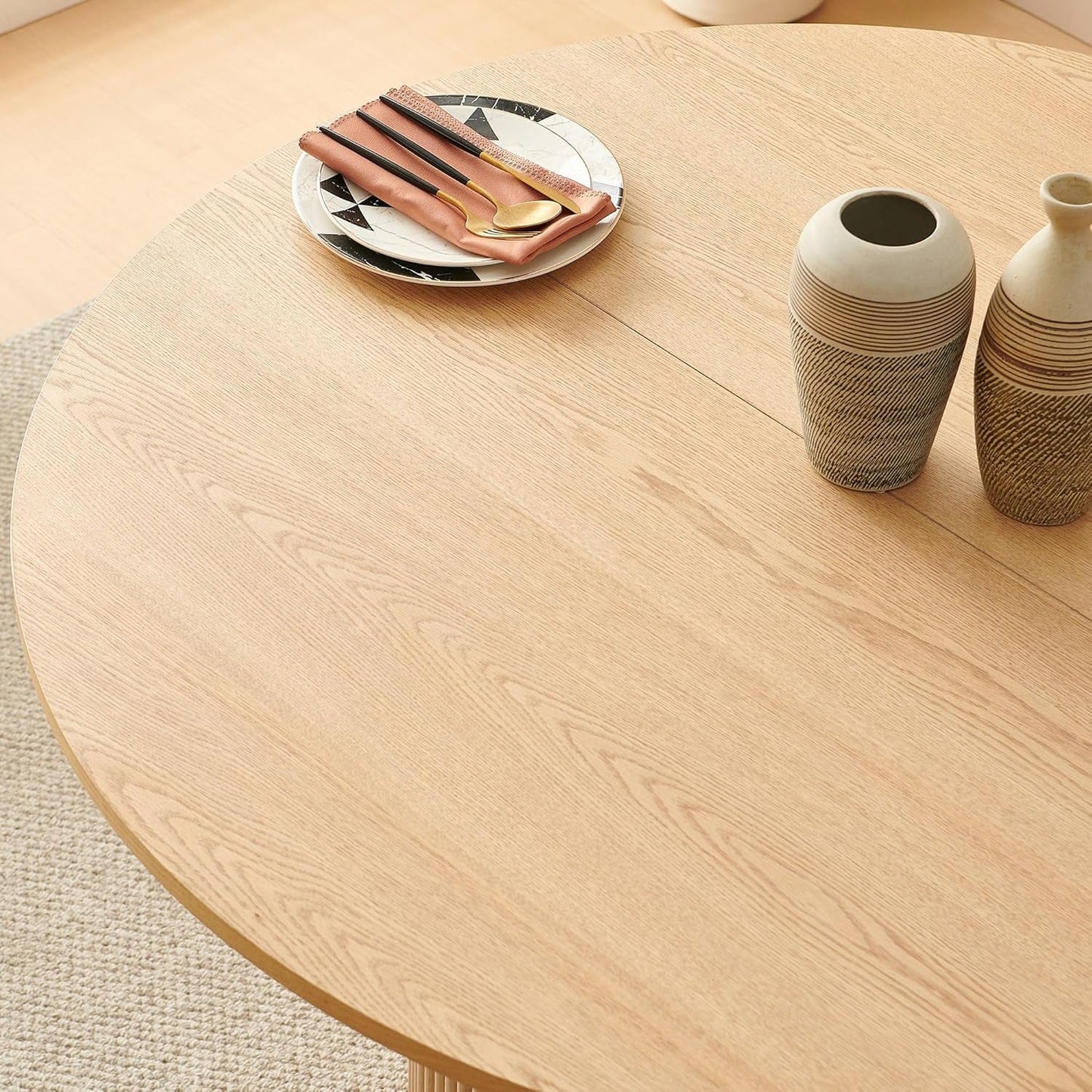 47 Inch Round Dining Table Set Beige Oak Boucle Padded Seating with decorative vases and cutlery on top.