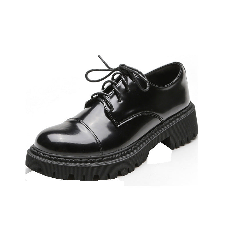 Women’s Solid-Color Retro Slip-On Platform Shoes in black with mesh lining, showcasing vintage style and modern comfort.