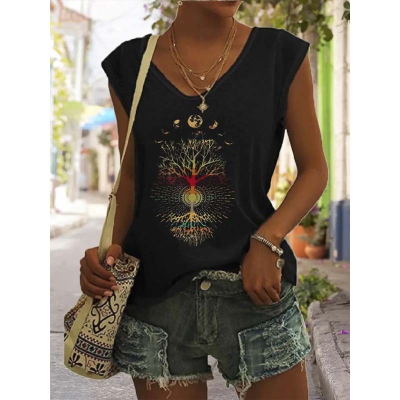 Woman wearing Women's Bohemian Moon And Tree Graphic Tee in outdoor setting