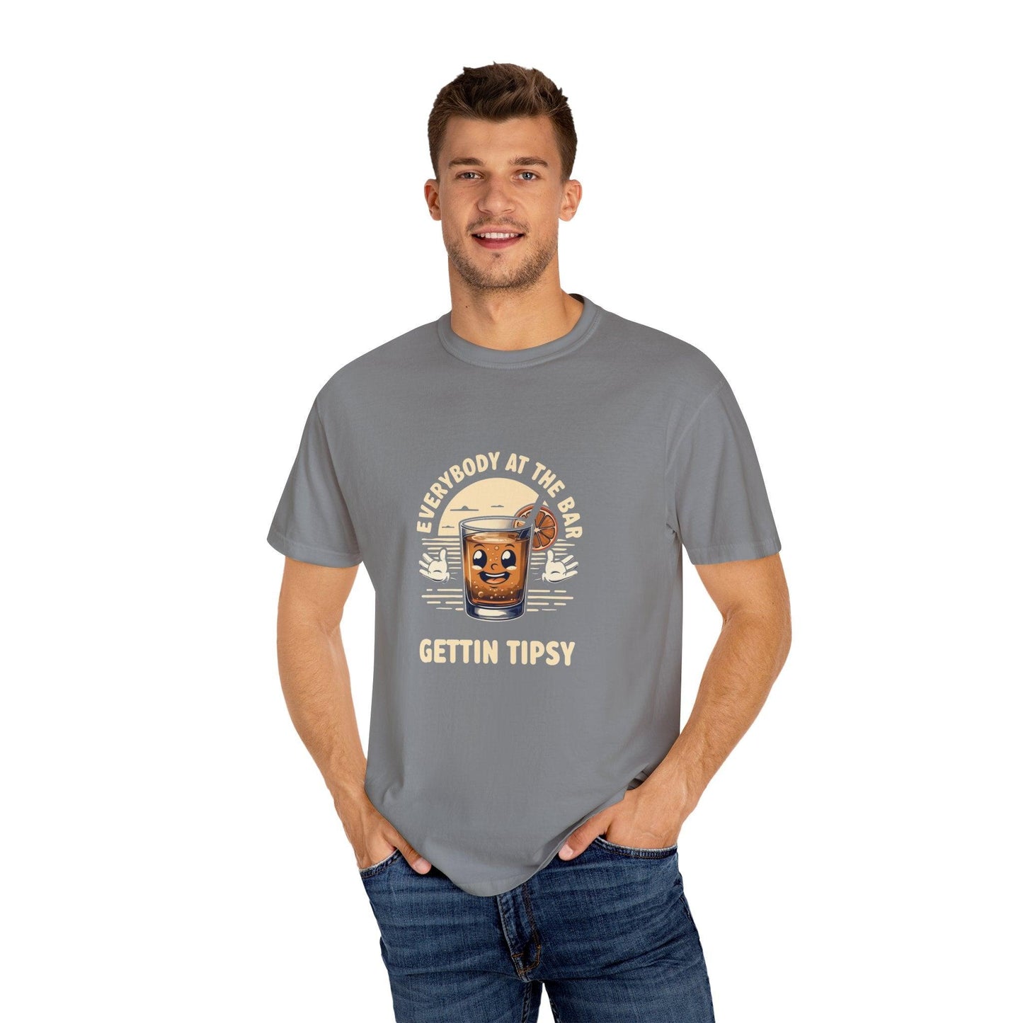 Model wearing Everybody at the Bar Gettin Tipsy Unisex Garment-Dyed T-Shirt with whiskey glass graphic.