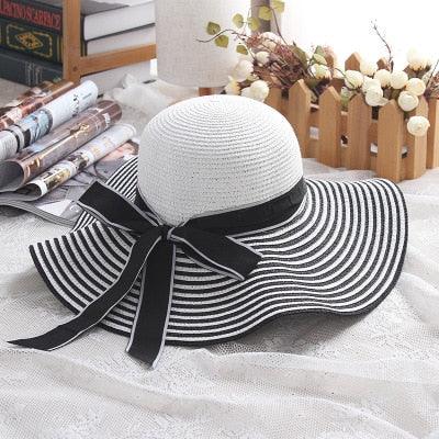 Audrey Hepburn Inspired Sun Hat – Elegant and Stylish for Cowgirl Women, featuring black-and-white stripes and ribbon bow.