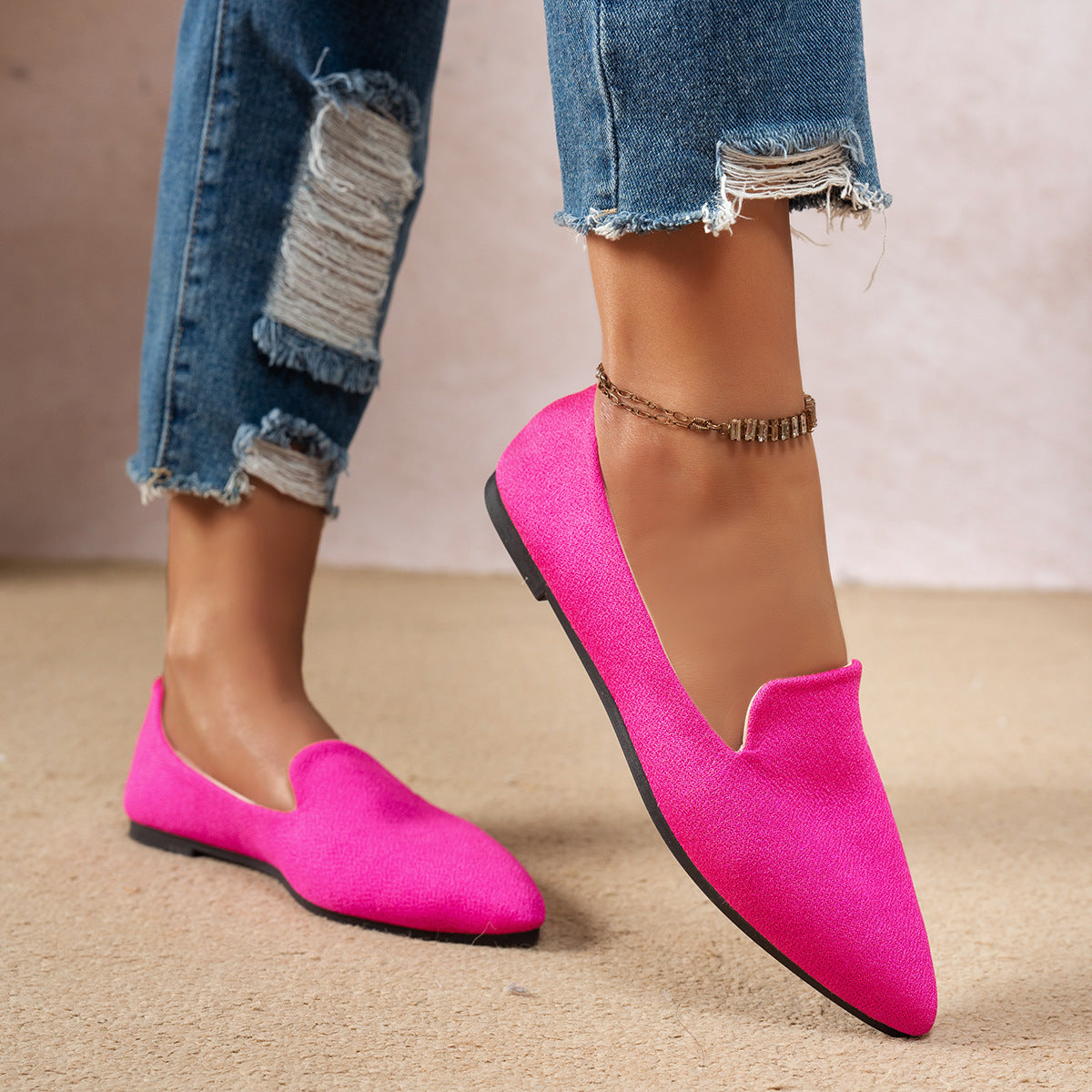 Women’s Flat Pointed-Toe Thin Shoes — Casual Everyday Flats in vibrant pink, worn with distressed jeans, showcasing effortless style.