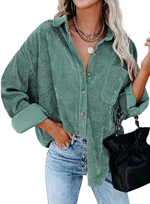 Woman wearing Corduroy Country Chic Shirt – Stylish Single-Breasted Cowgirl Shirt in green with jeans and holding a black bag.