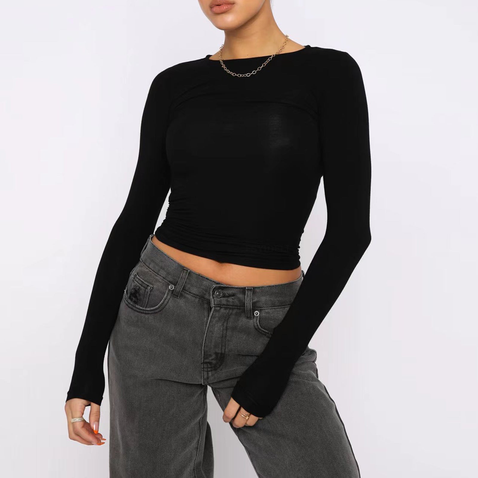 Model wearing Slim Fit Long Sleeve Shirt | Women's Casual Crop Tops in black with gray jeans, showcasing the stylish pullover design.
