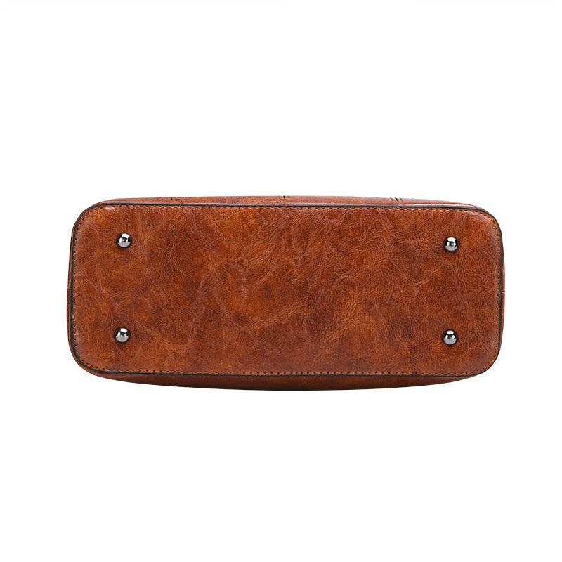 Base of Luxury 3 Piece Leather Tote Set | Genuine Leather Cowgirl Shoulder Bag & Clutch showing quality craftsmanship.