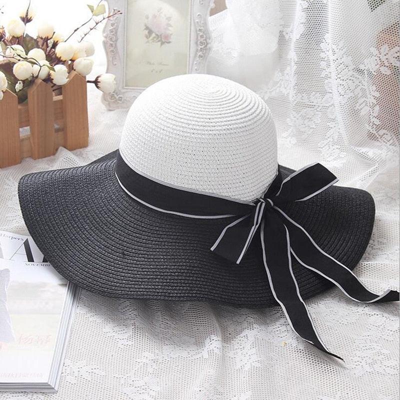 Audrey Hepburn Inspired Sun Hat – Elegant and Stylish for Cowgirl Women with black-and-white stripes and a ribbon bow.