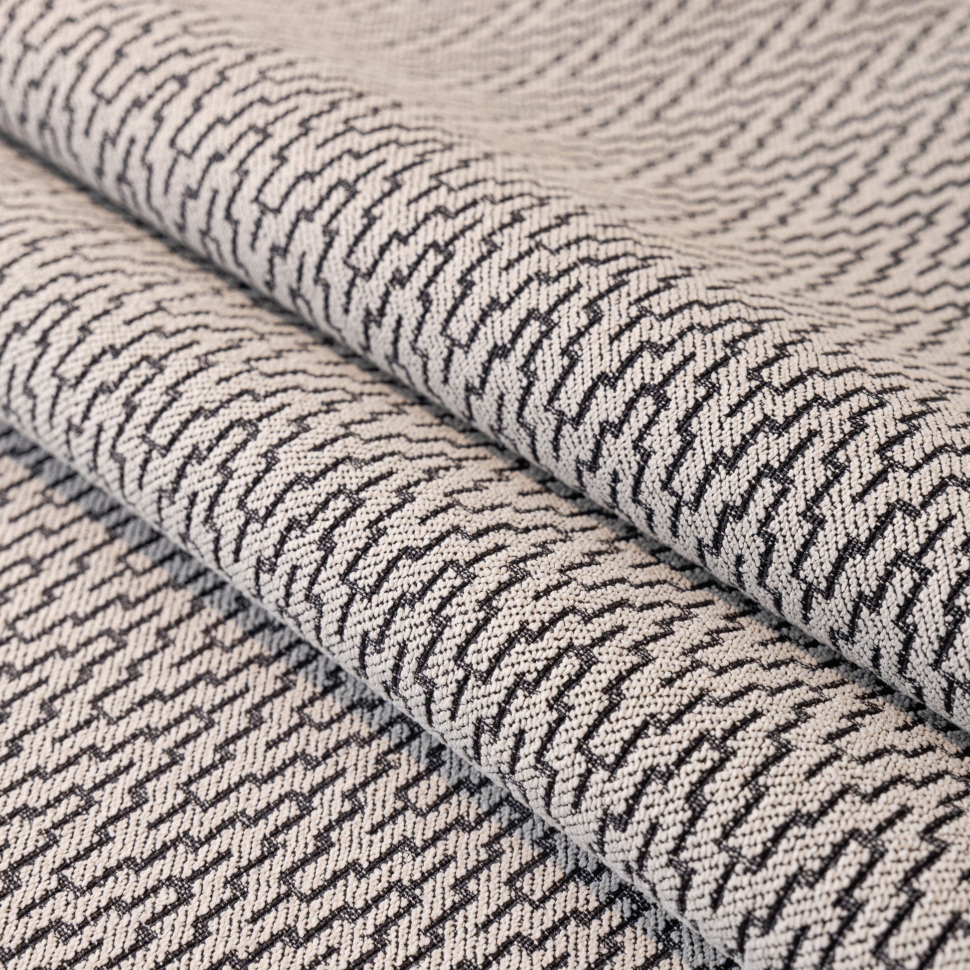Close-up of chenille Non-Slip Couch Cover with Gold Trim, Sofa Slipcover for Sectional & Loveseat featuring chevron pattern
