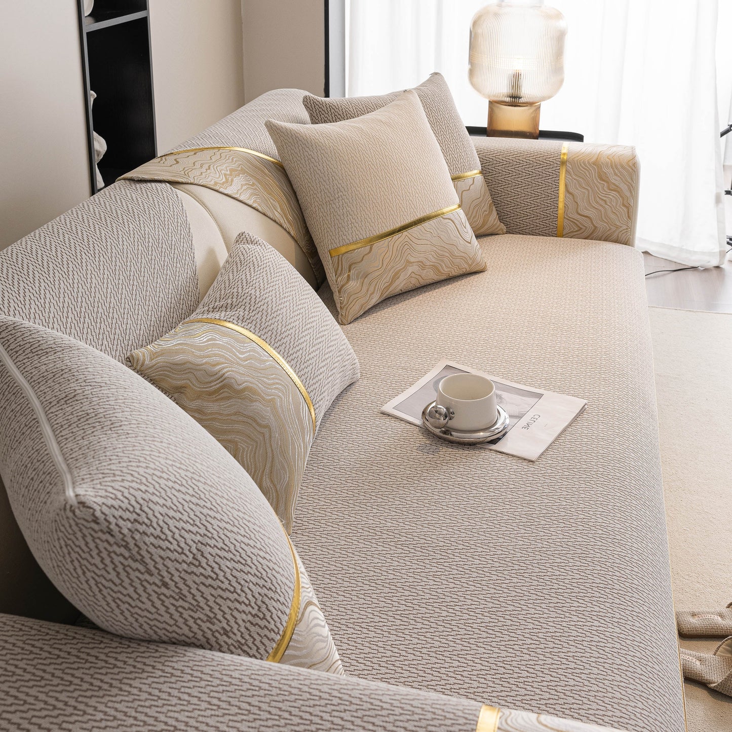 Non-Slip Couch Cover with Gold Trim on a sectional sofa, showcasing chenille fabric and anti-slip design for elegance and practicality