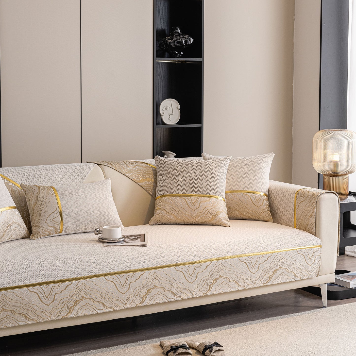 Non-Slip Couch Cover with Gold Trim on a sleek sectional sofa, featuring chenille fabric with chevron and rock motifs, by SlipcoverKAS.