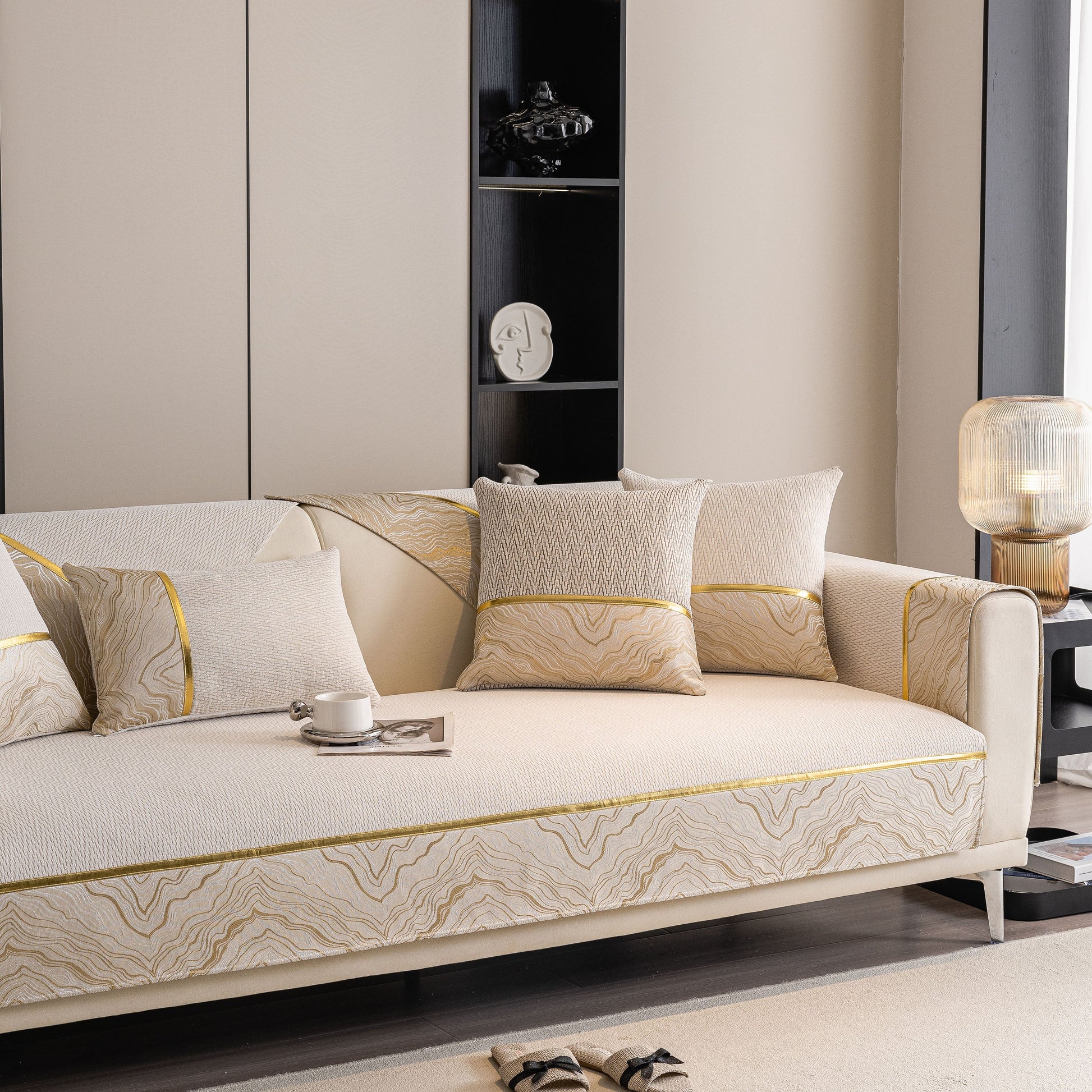 Non-Slip Couch Cover with Gold Trim on a sleek sectional sofa, featuring chenille fabric with chevron and rock motifs, by SlipcoverKAS.