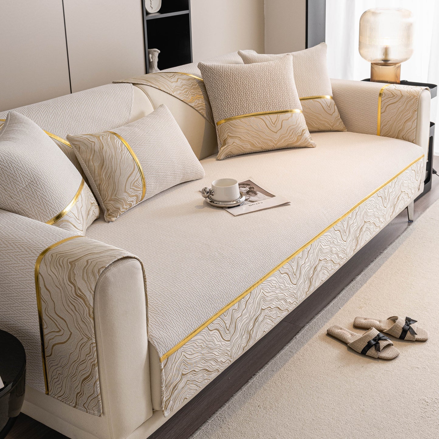 Non-Slip Couch Cover with Gold Trim on a sectional, featuring chenille fabric and silicone anti-slip backing, by SlipcoverKAS.