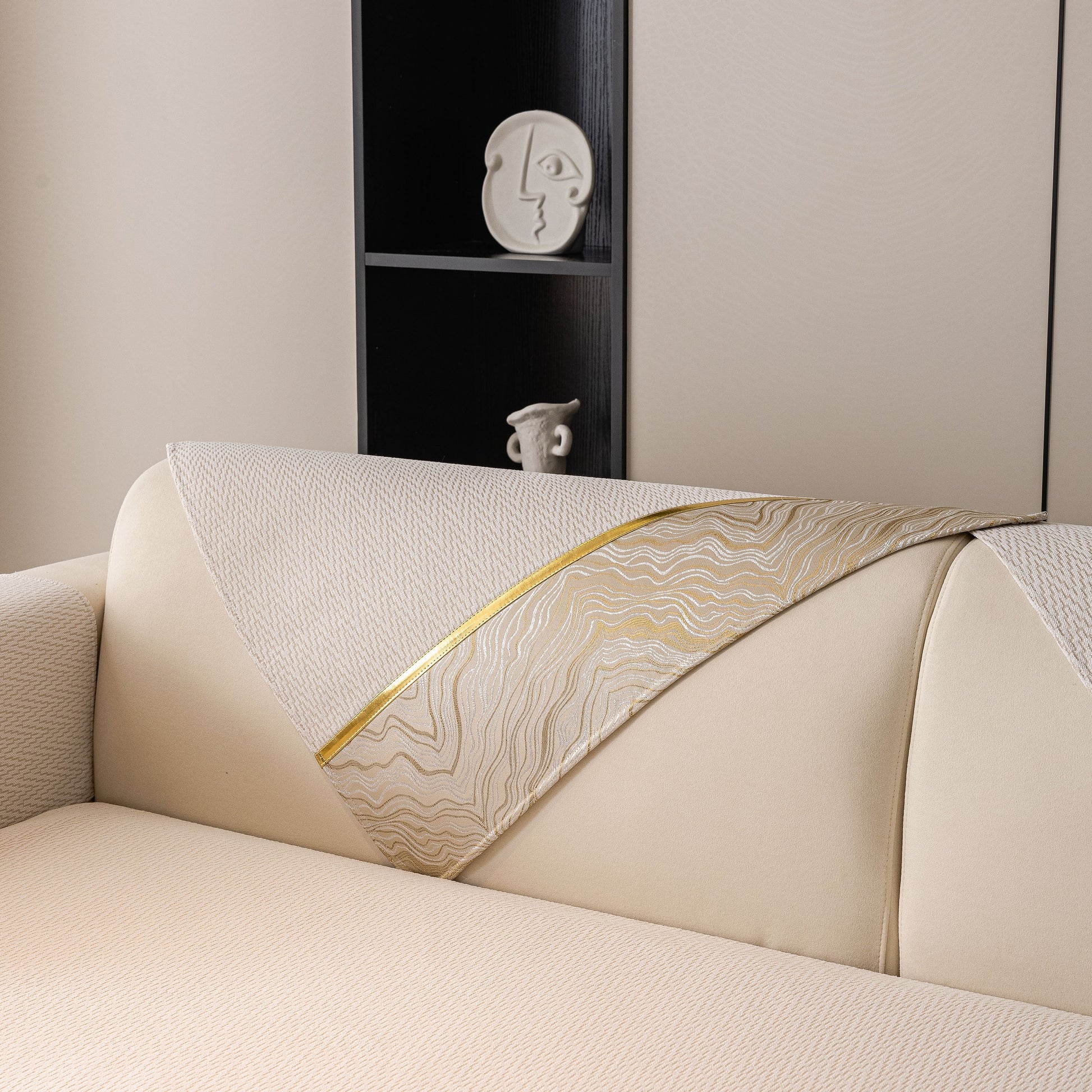 Non-Slip Couch Cover with Gold Trim, Sofa Slipcover for Sectional & Loveseat on a beige couch with chevron and rock-layer patterns.