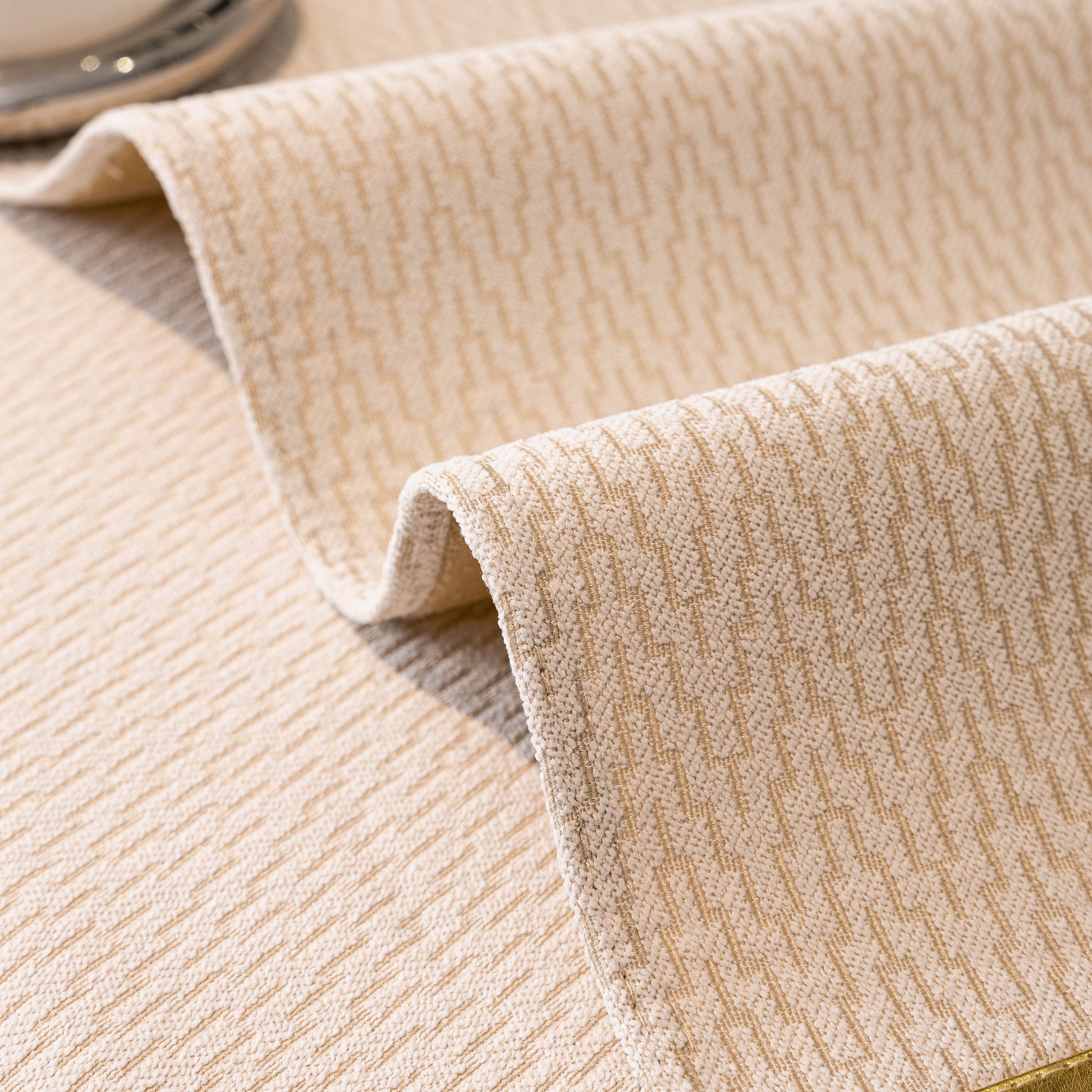 Non-Slip Couch Cover with Gold Trim, Sofa Slipcover for Sectional & Loveseat showing chenille weave texture and gold edge trim.