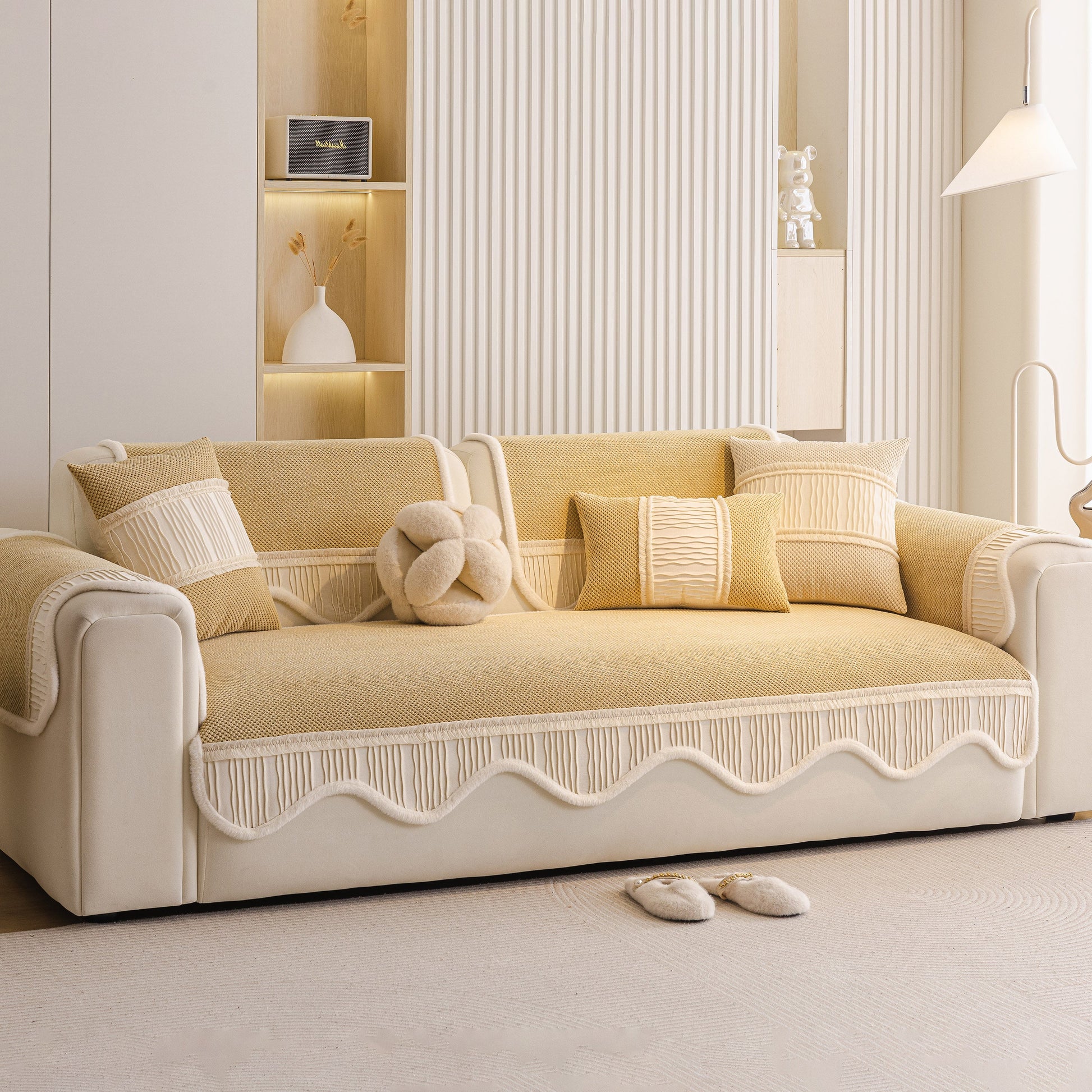 Dog Washable Sofa Protector Cover, Non-Slip Couch Slipcover with Soft Furry Trim in beige, on a cream sofa in modern living room.