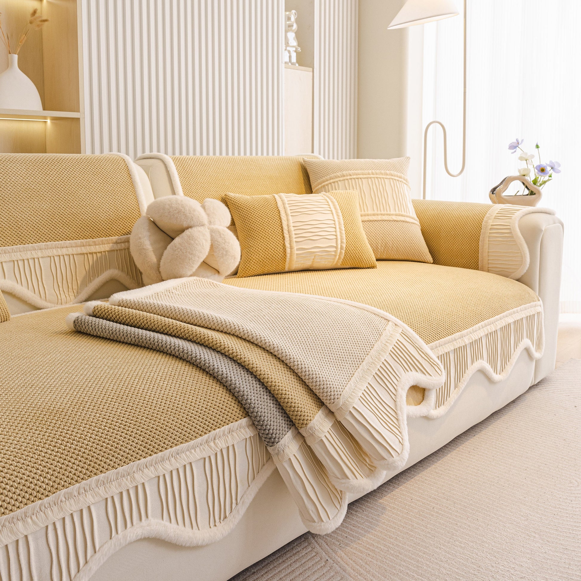 Dog Washable Sofa Protector Cover, Non-Slip Couch Slipcover with Soft Furry Trim in beige with gray accents on a modern sofa.