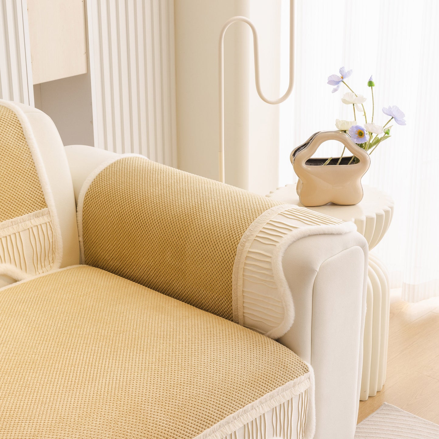 Dog Washable Sofa Protector Cover, Non-Slip Couch Slipcover with Soft Furry Trim in beige on a white sofa.