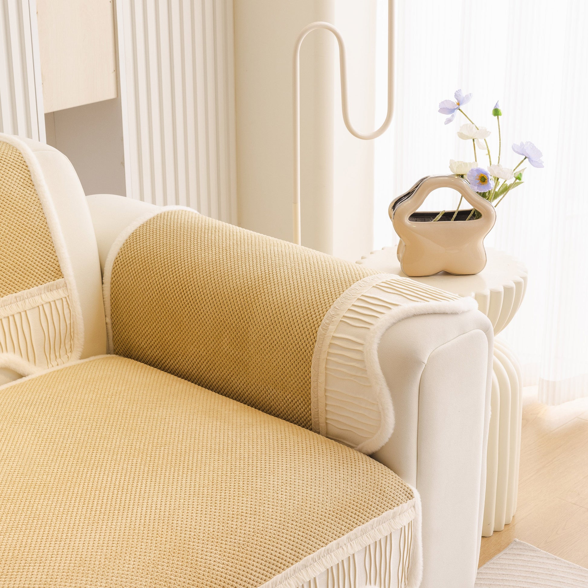 Dog Washable Sofa Protector Cover, Non-Slip Couch Slipcover with Soft Furry Trim in beige on a white sofa.