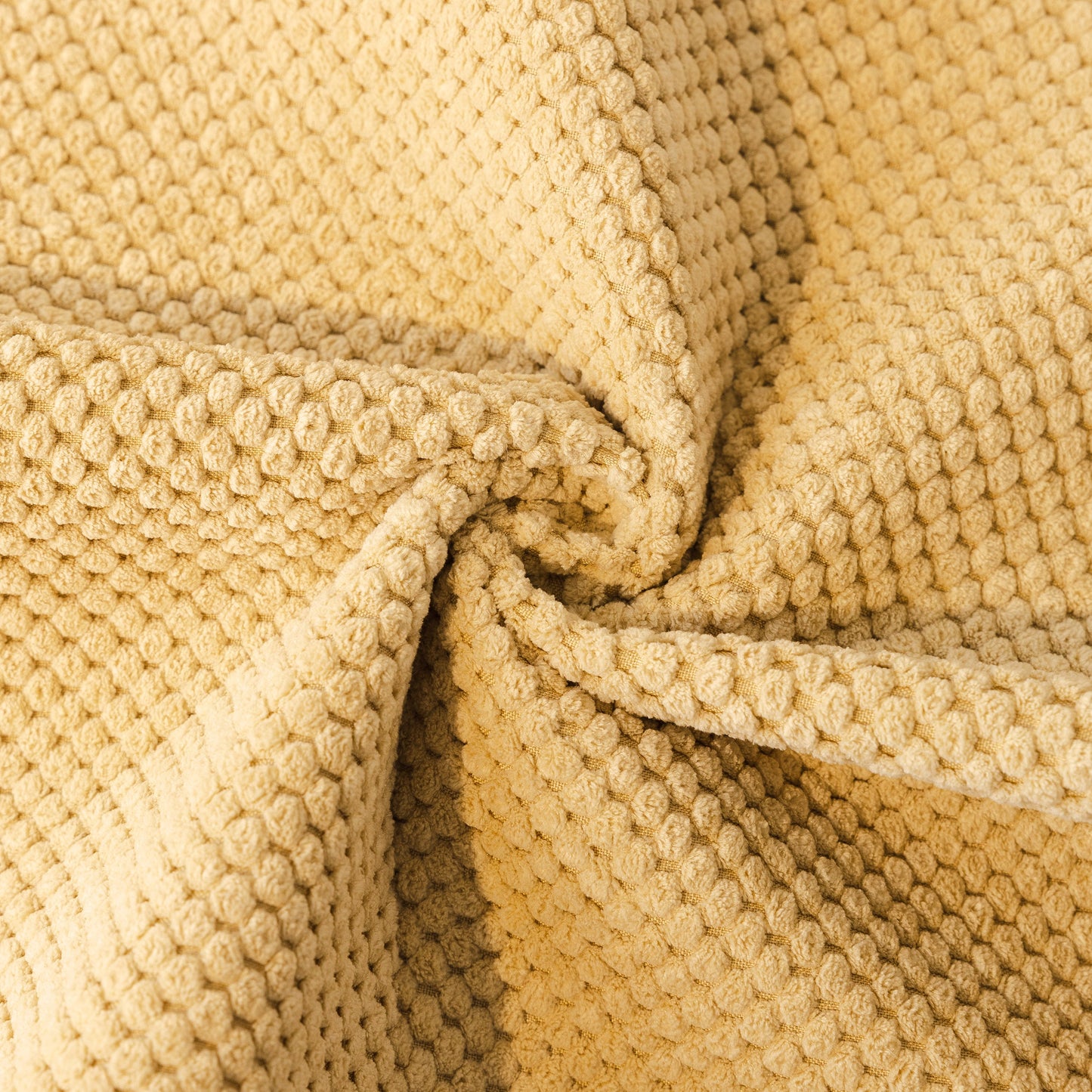 Close-up of the honeycomb texture on the Dog Washable Sofa Protector Cover, Non-Slip Couch Slipcover with Soft Furry Trim.