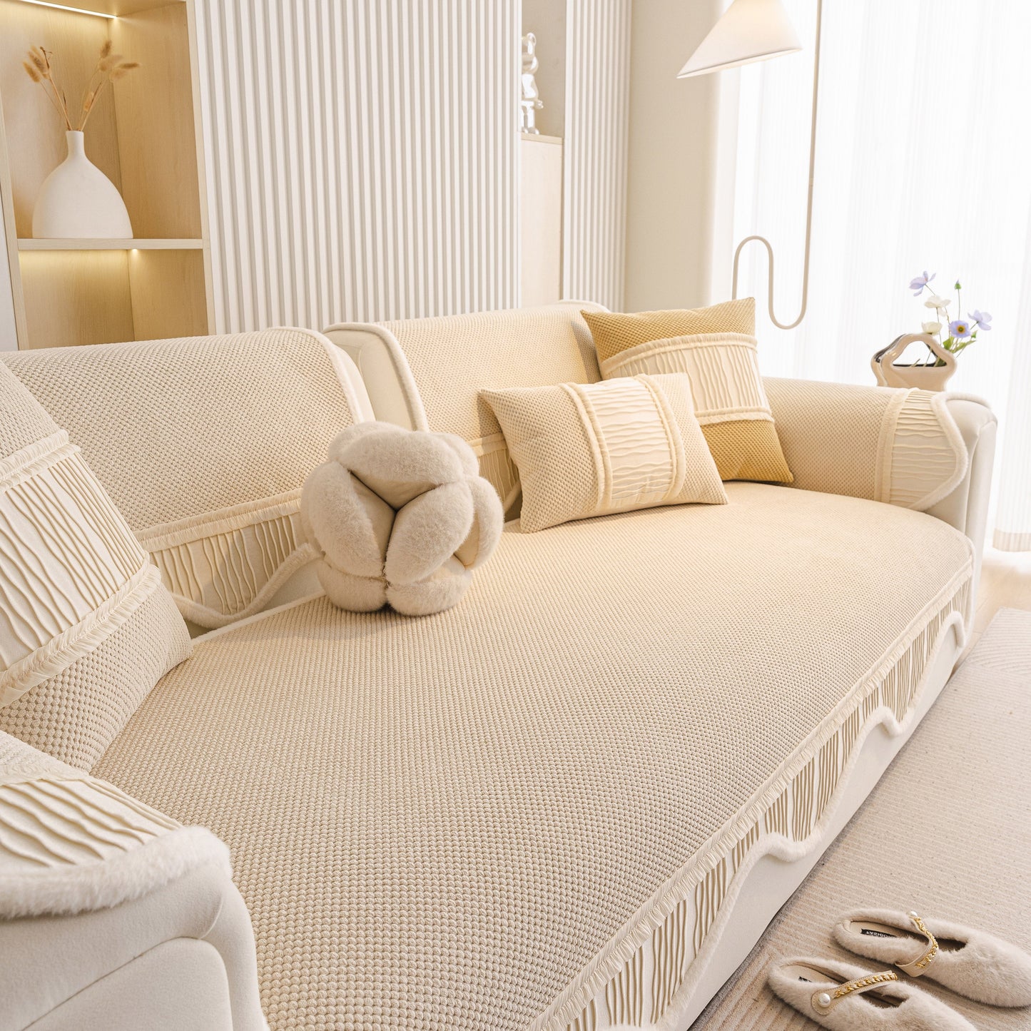 Dog Washable Sofa Protector Cover, Non-Slip Couch Slipcover with Soft Furry Trim in beige with decorative pillows in a cozy living room.