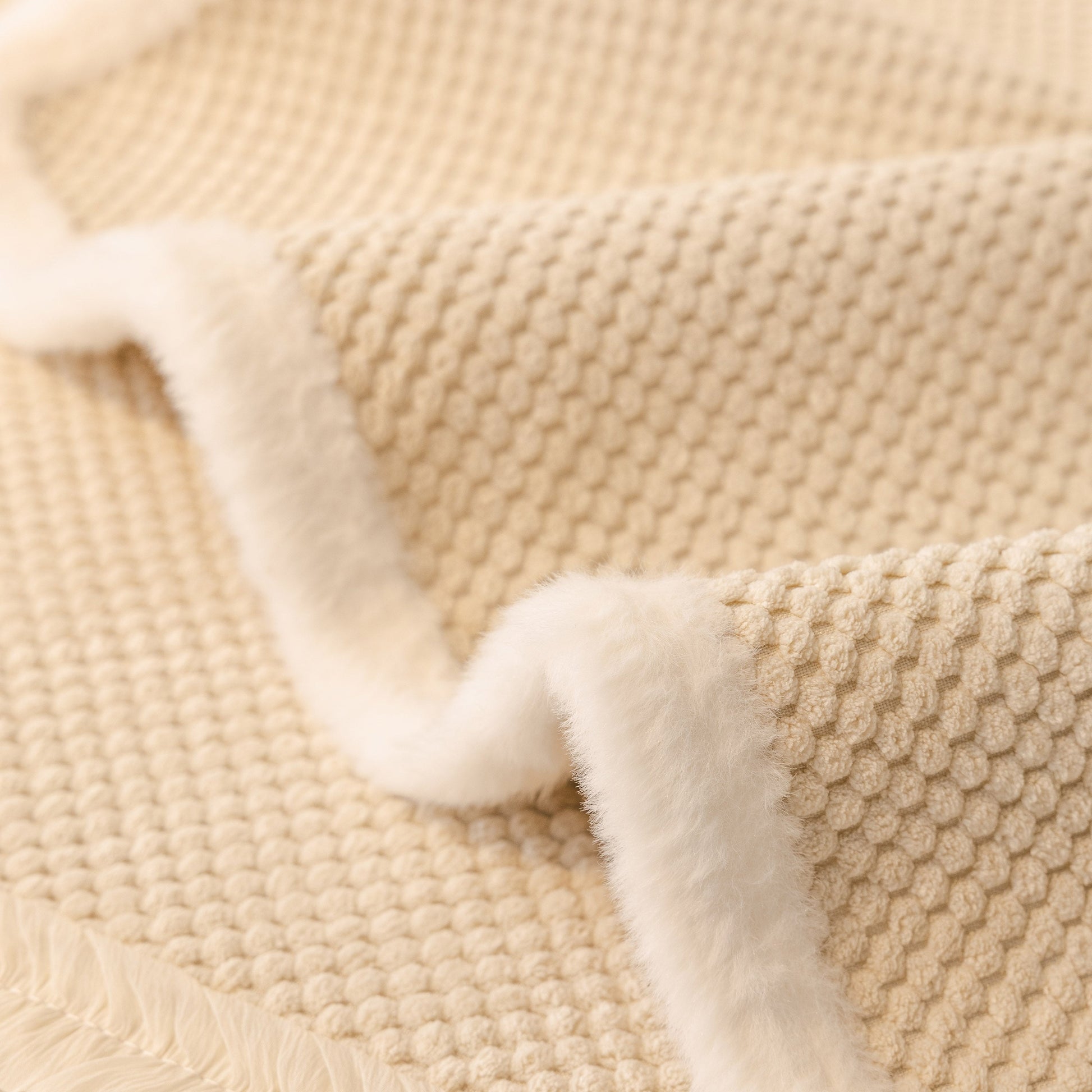 Dog Washable Sofa Protector Cover, Non-Slip Couch Slipcover with Soft Furry Trim in beige with textured pattern and faux fur edge.