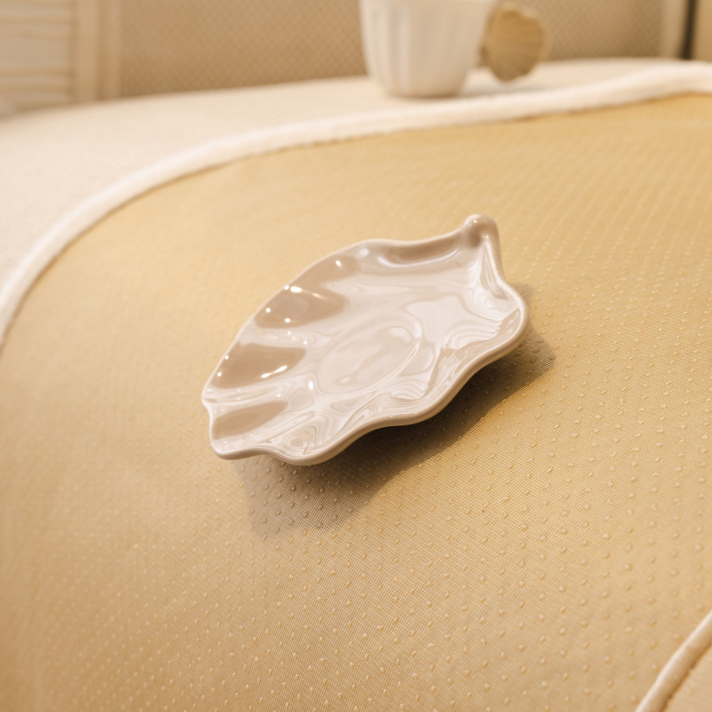 Dog Washable Sofa Protector Cover, Non-Slip Couch Slipcover with Soft Furry Trim displayed on a beige couch.