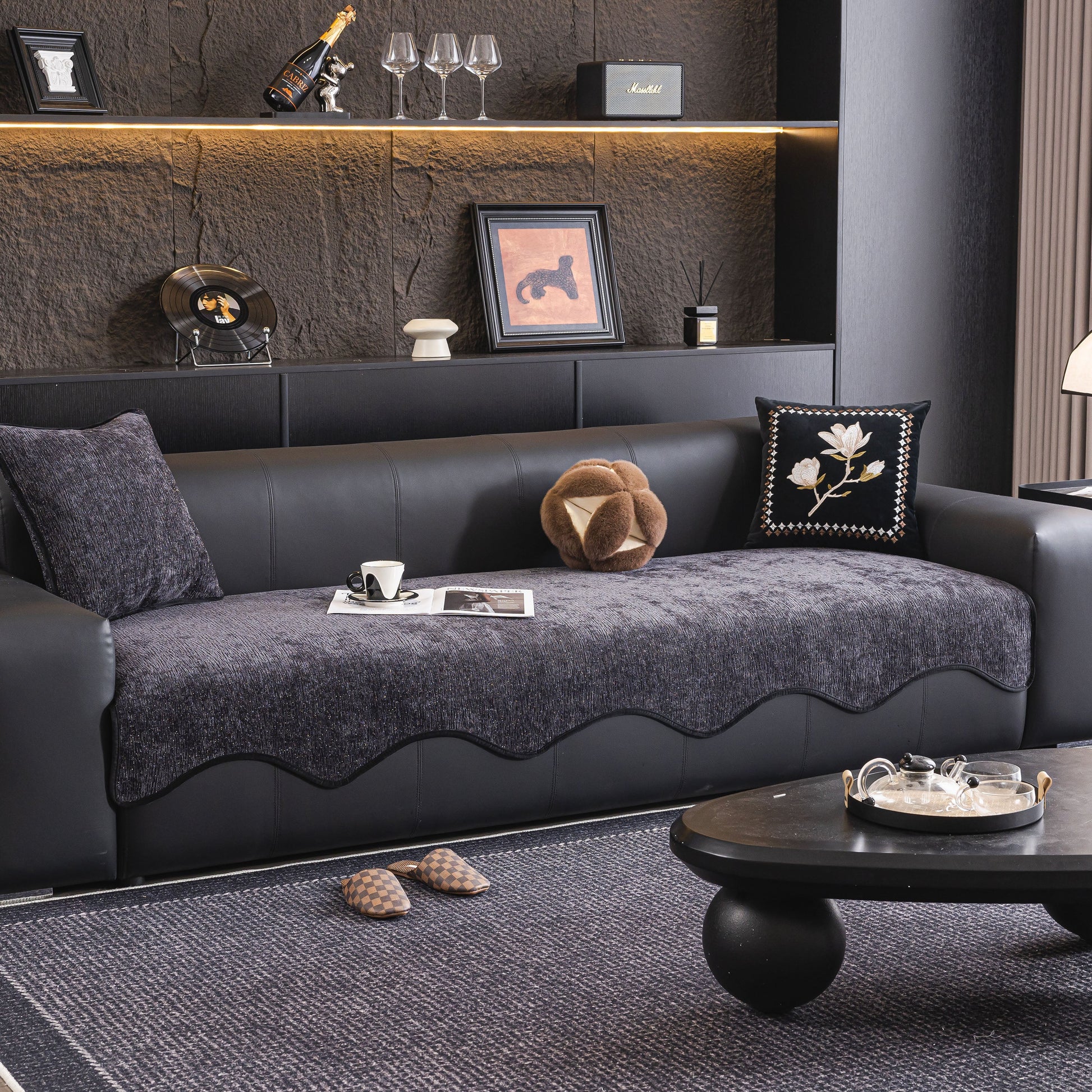 Chenille Couch Cover with Scalloped Edge, Non-Slip Modular Slipcover Sectional on black leather sofa.