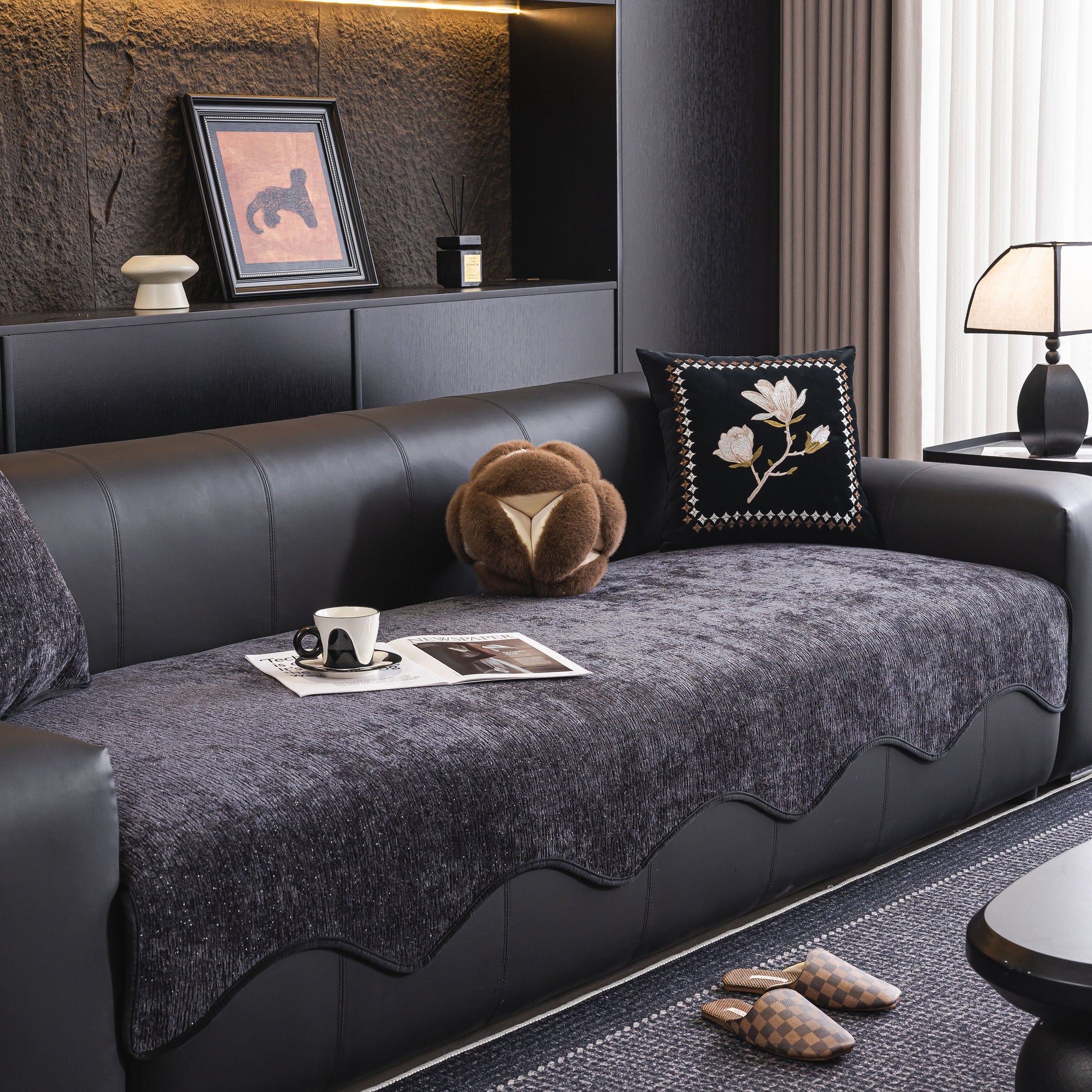 Chenille Couch Cover with Scalloped Edge, Non-Slip Modular Slipcover Sectional on a leather sofa in a modern living room