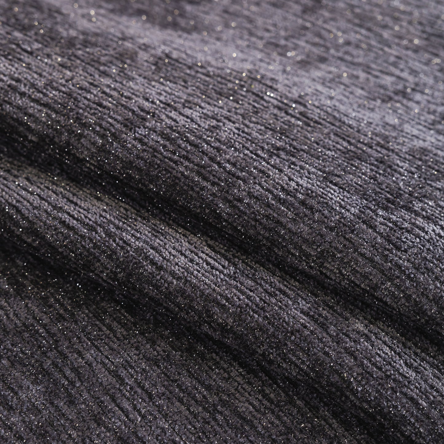 Close-up of black chenille fabric texture for Chenille Couch Cover with Scalloped Edge, Non-Slip Modular Slipcover Sectional.
