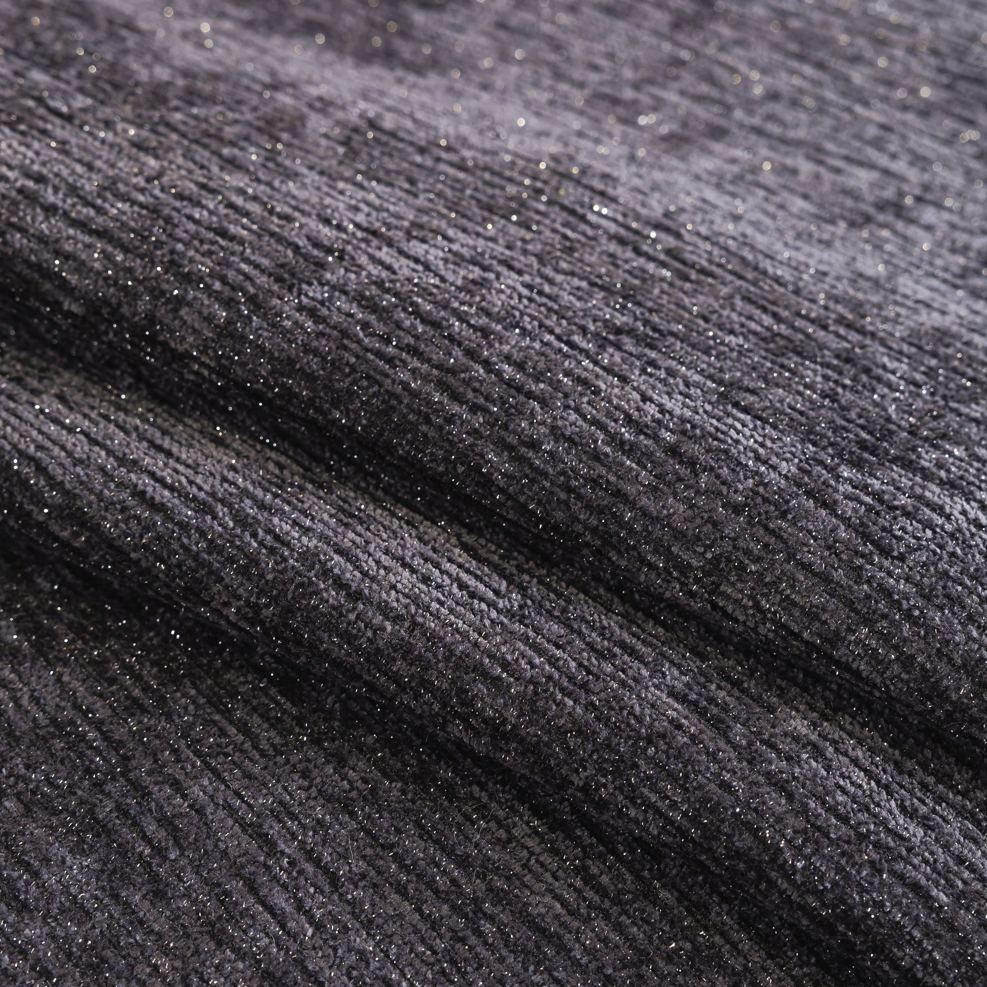 Close-up of black chenille fabric texture for Chenille Couch Cover with Scalloped Edge, Non-Slip Modular Slipcover Sectional.