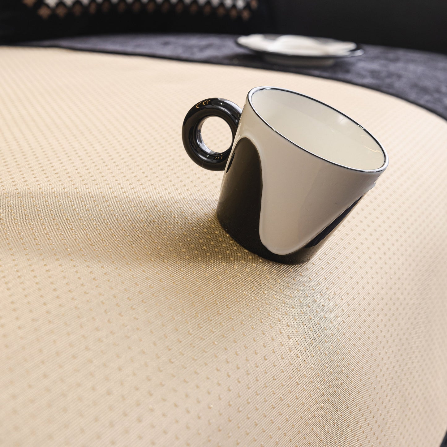 Non-slip surface detail of Chenille Couch Cover with Scalloped Edge, Non-Slip Modular Slipcover Sectional featuring black and white cup.