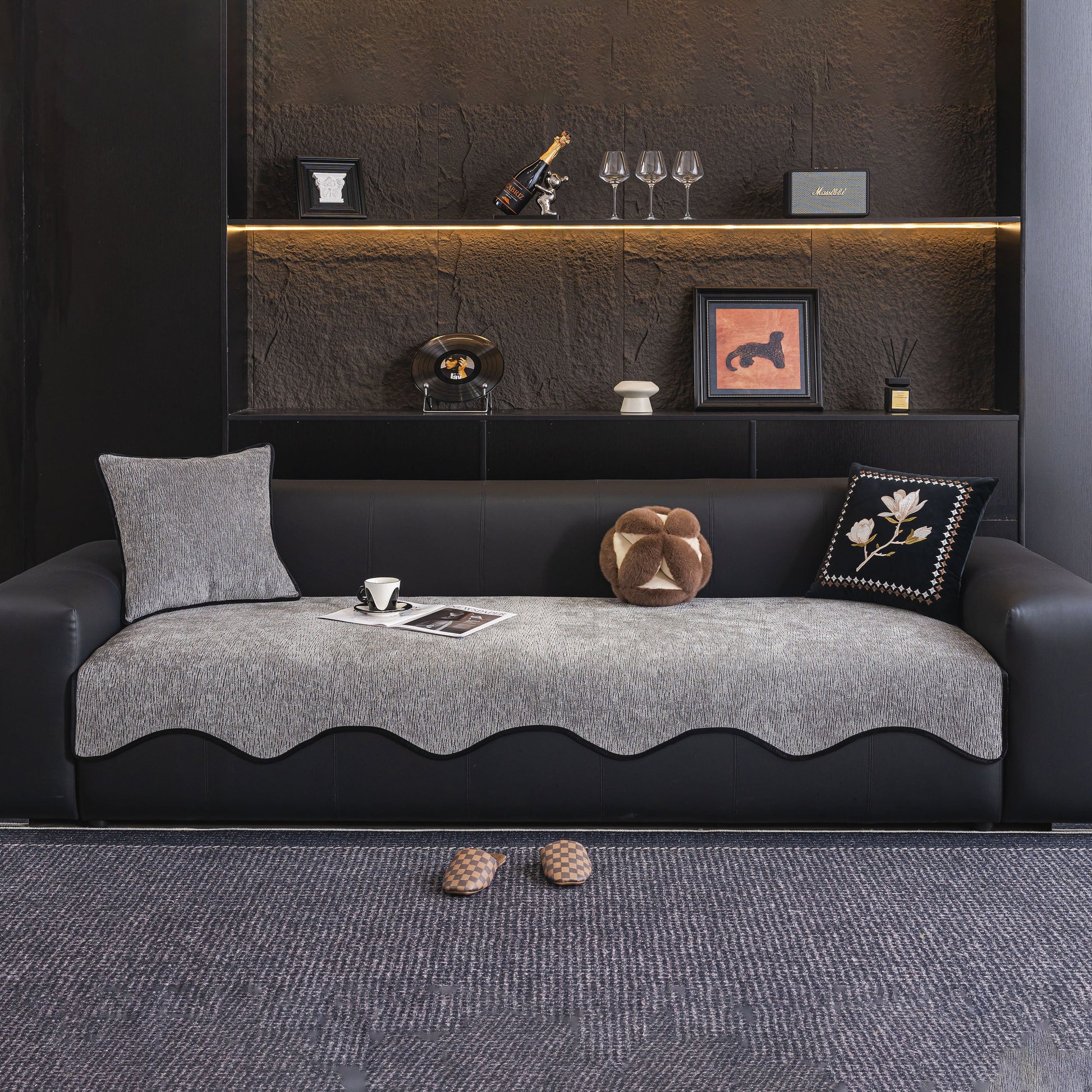 Chenille Couch Cover with Scalloped Edge on black sofa in a modern living room setting.