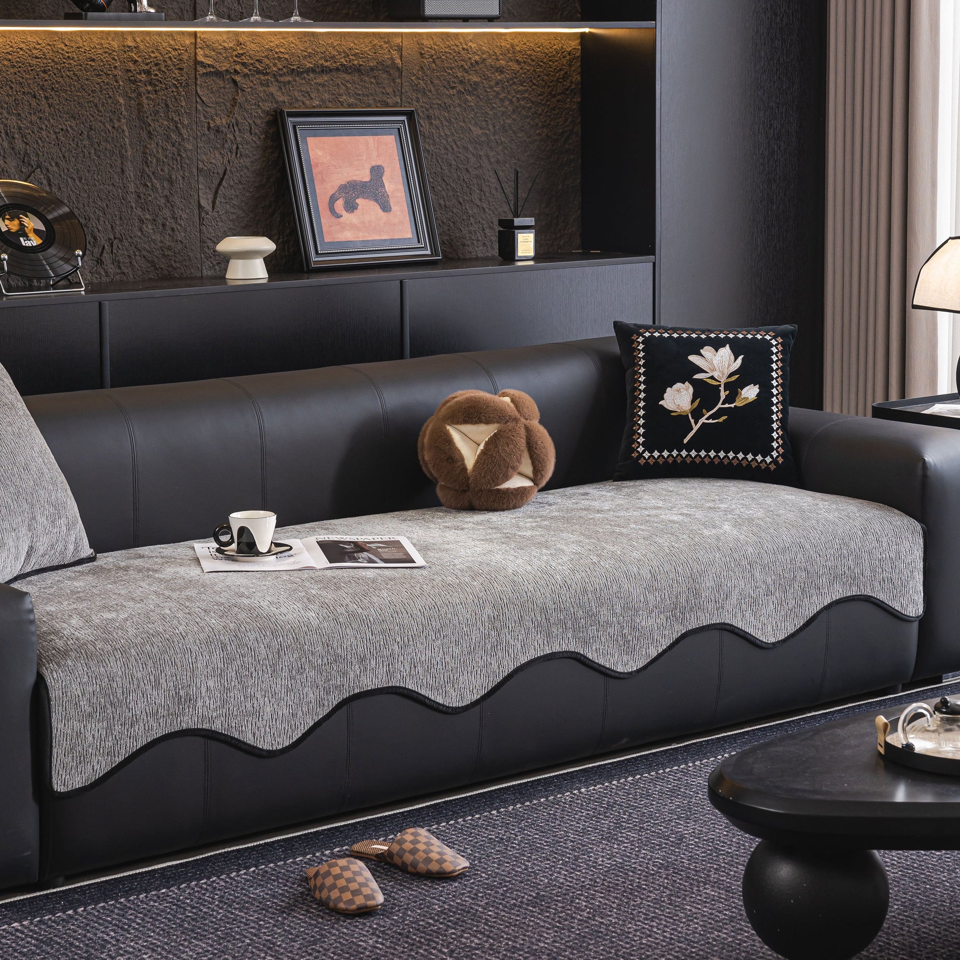 Chenille Couch Cover with Scalloped Edge, Non-Slip Modular Slipcover Sectional on black sofa in modern living room setting.