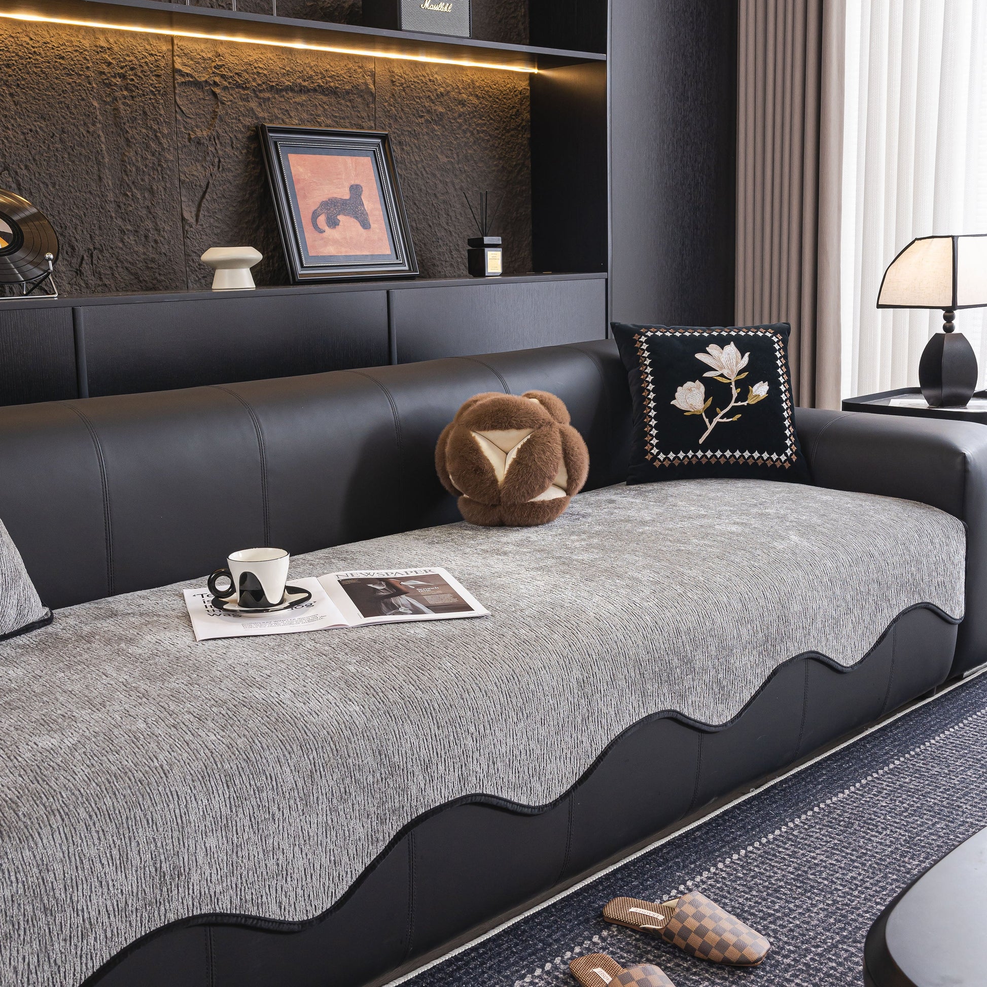 Chenille Couch Cover with Scalloped Edge, Non-Slip Modular Slipcover Sectional on leather sofa in modern living room.