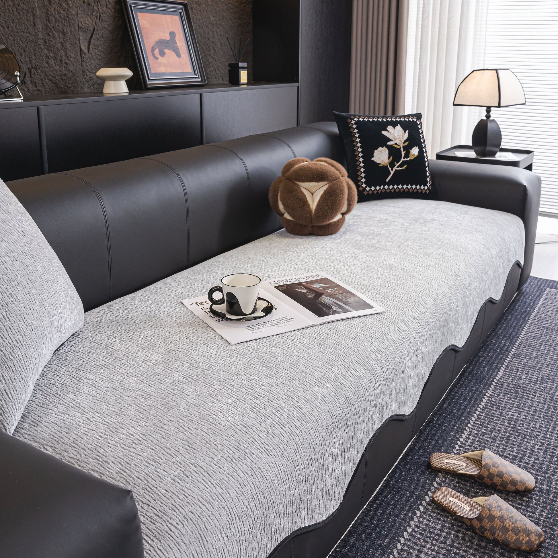 Chenille Couch Cover with Scalloped Edge, Non-Slip Modular Slipcover Sectional on black sofa in modern living room setting