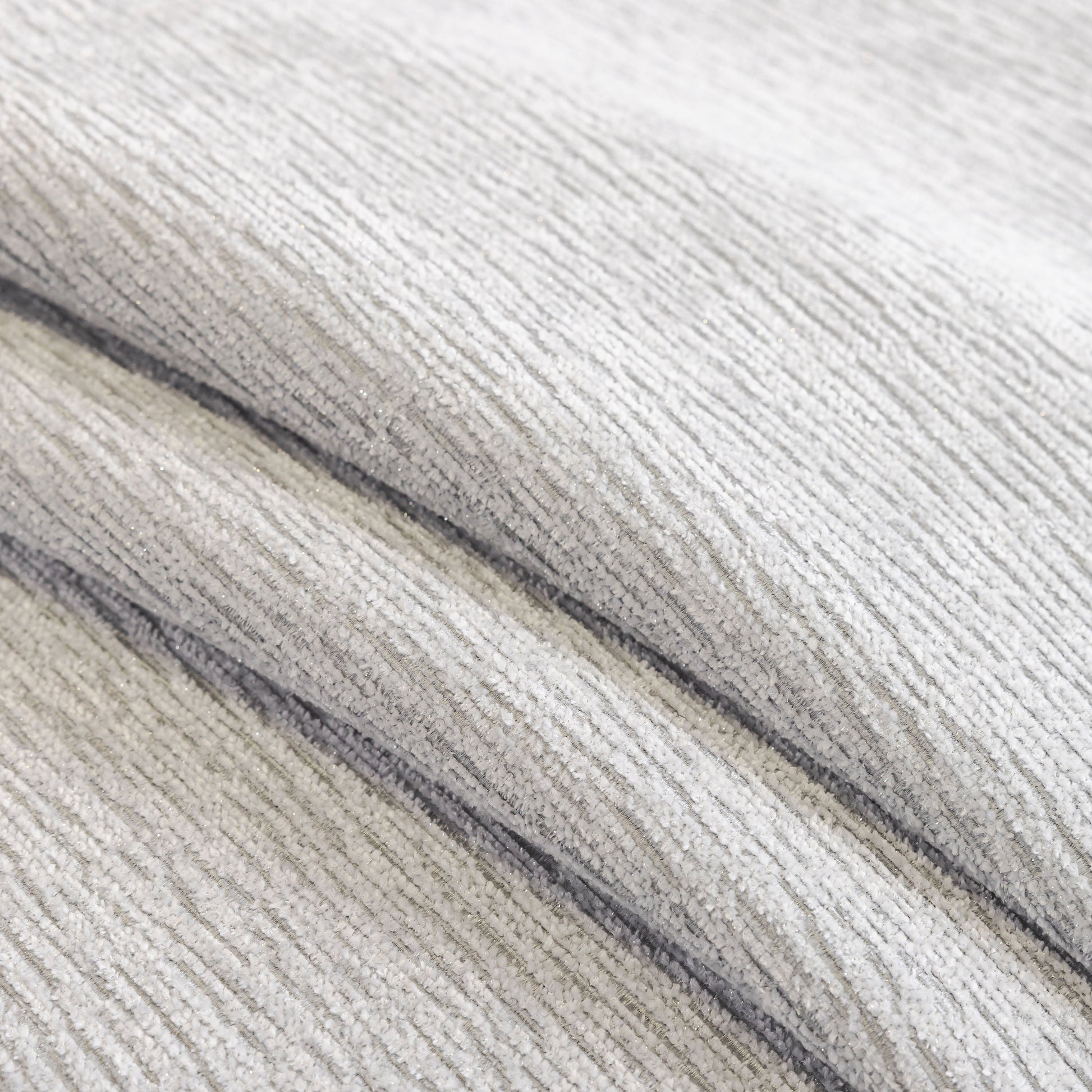 Close-up of Chenille Couch Cover with Scalloped Edge, Non-Slip Modular Slipcover Sectional, showcasing plush texture and elegant design.