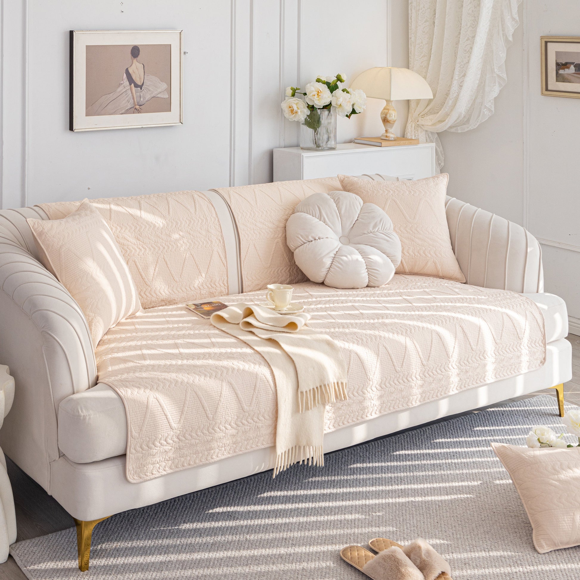 Geometric Textured Cotton Quilted Sofa Cover, Non-Slip Washable Couch Protector on a modern sofa in a stylish living room.