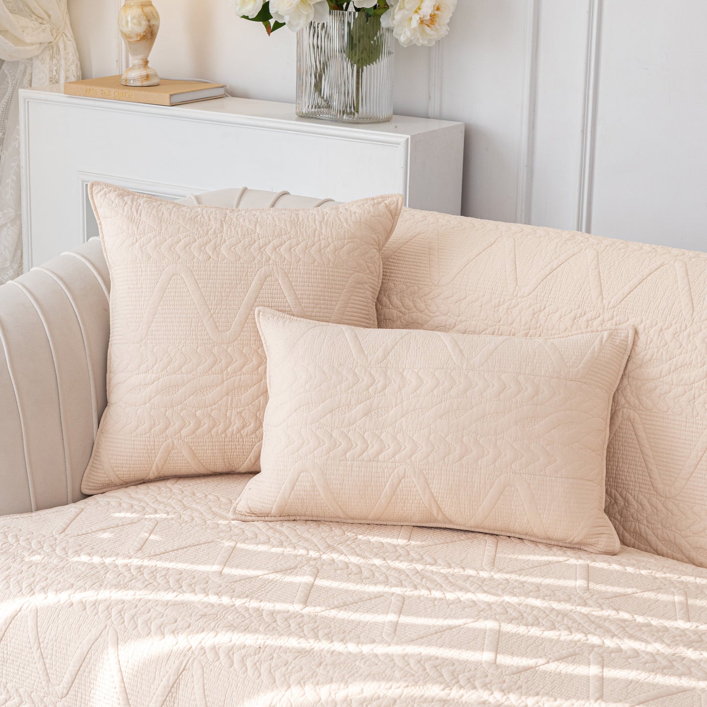 Geometric Textured Cotton Quilted Sofa Cover, Non-Slip Washable Couch Protector on modern living room furniture.