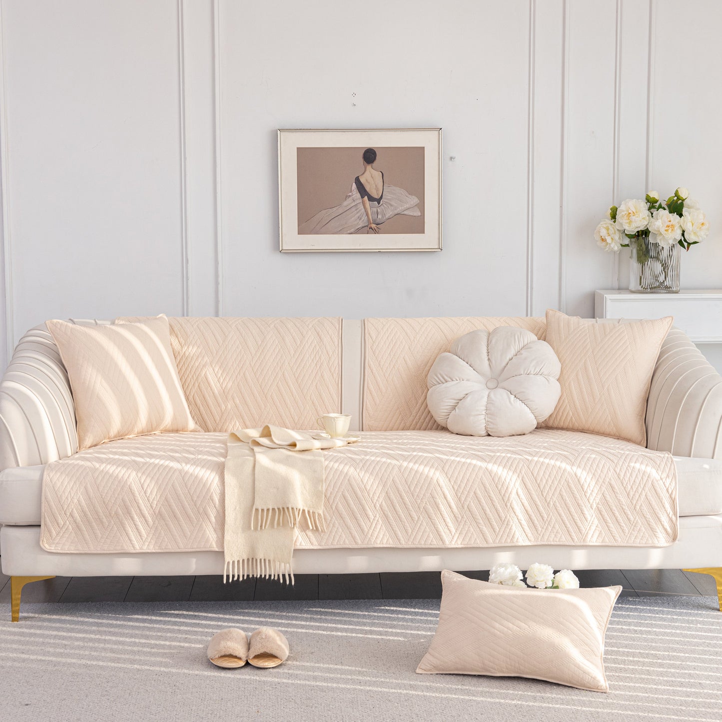 Quilted Geometric Cotton Sofa Cover on couch, Non-Slip & Thick Padded Furniture Covers, beige color, with matching pillows.