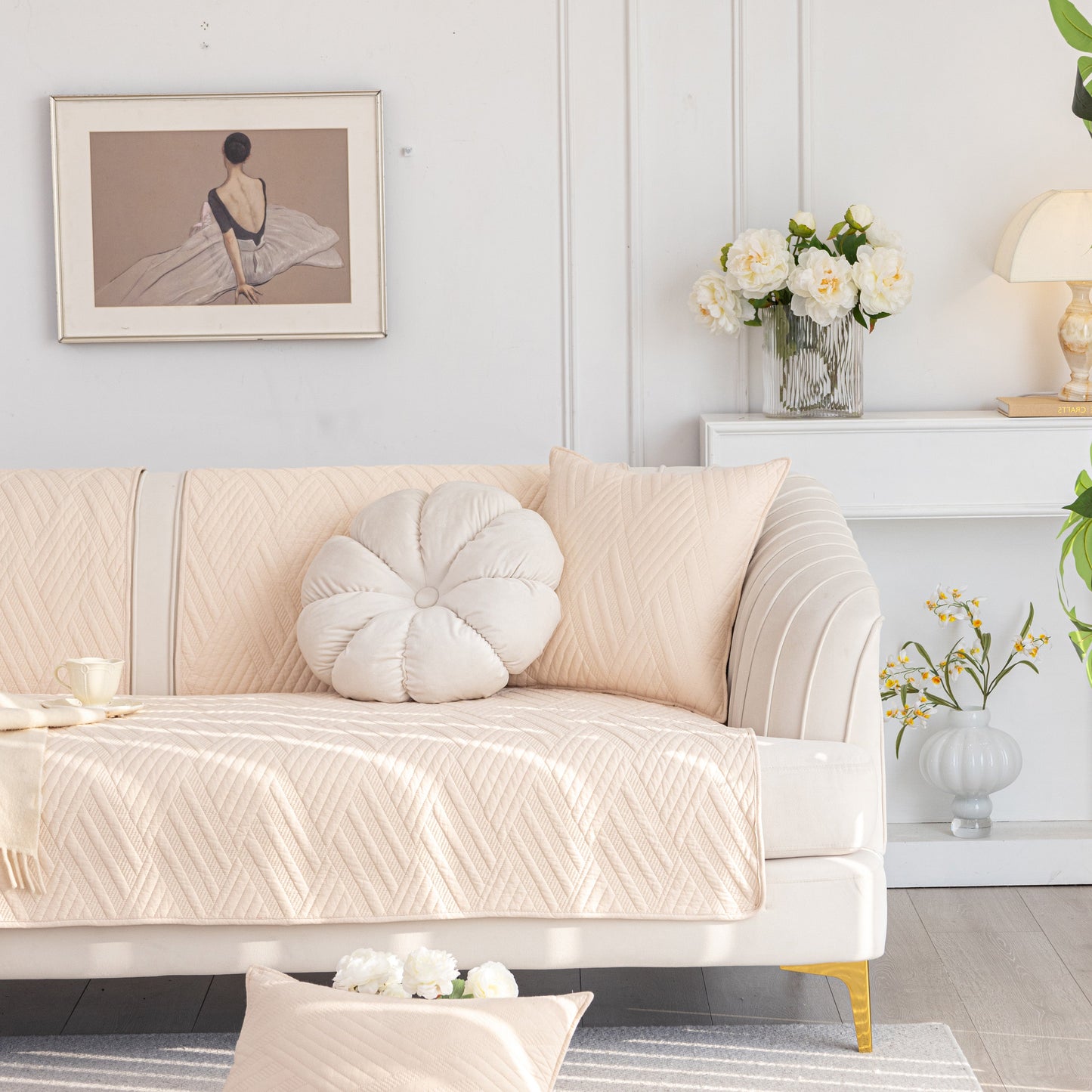 Beige quilted geometric cotton sofa cover, non-slip & thick padded furniture covers in a modern living room setting.