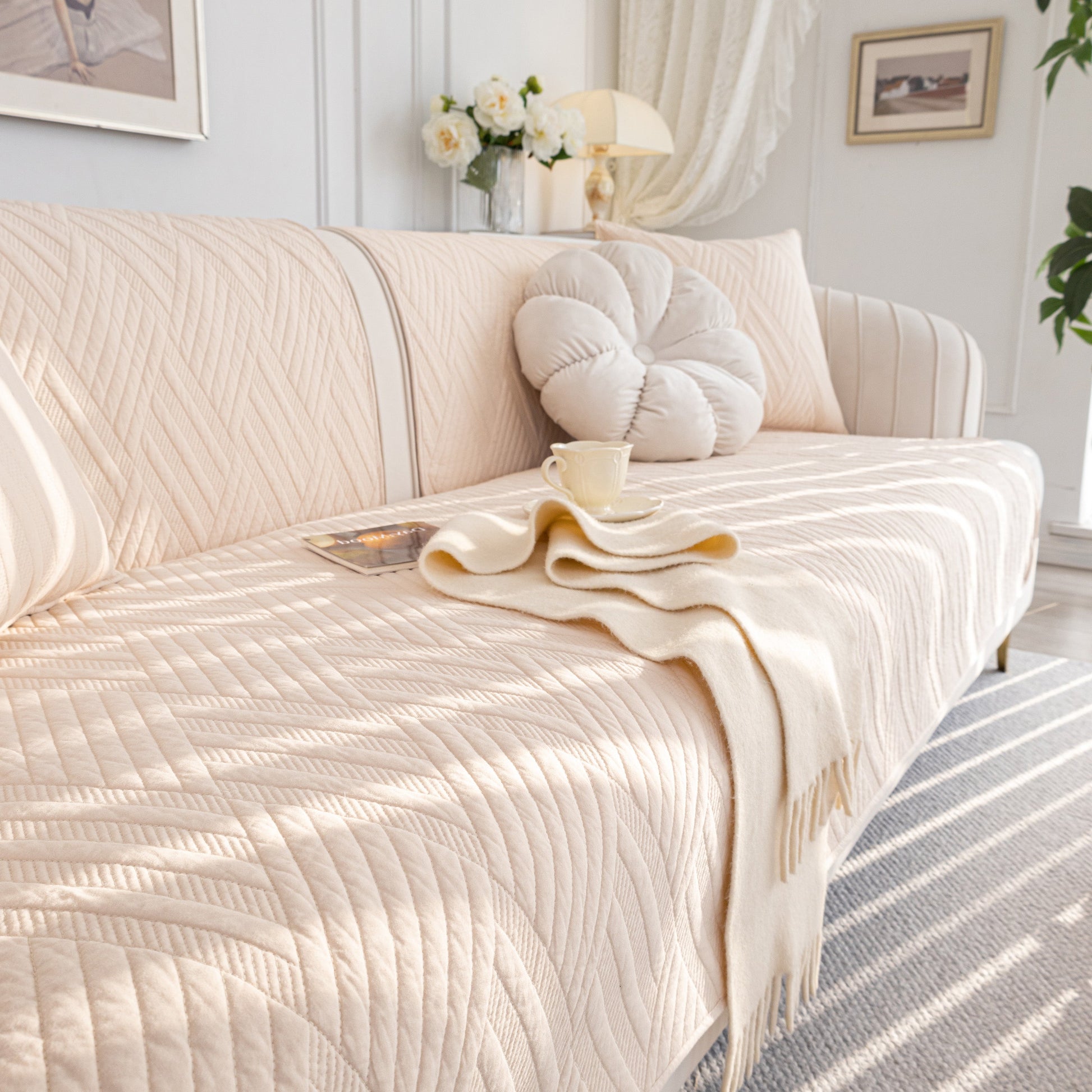 Quilted Geometric Cotton Sofa Cover, Non-Slip & Thick Padded Furniture Covers on a stylish sofa with decorative cushions and throw.