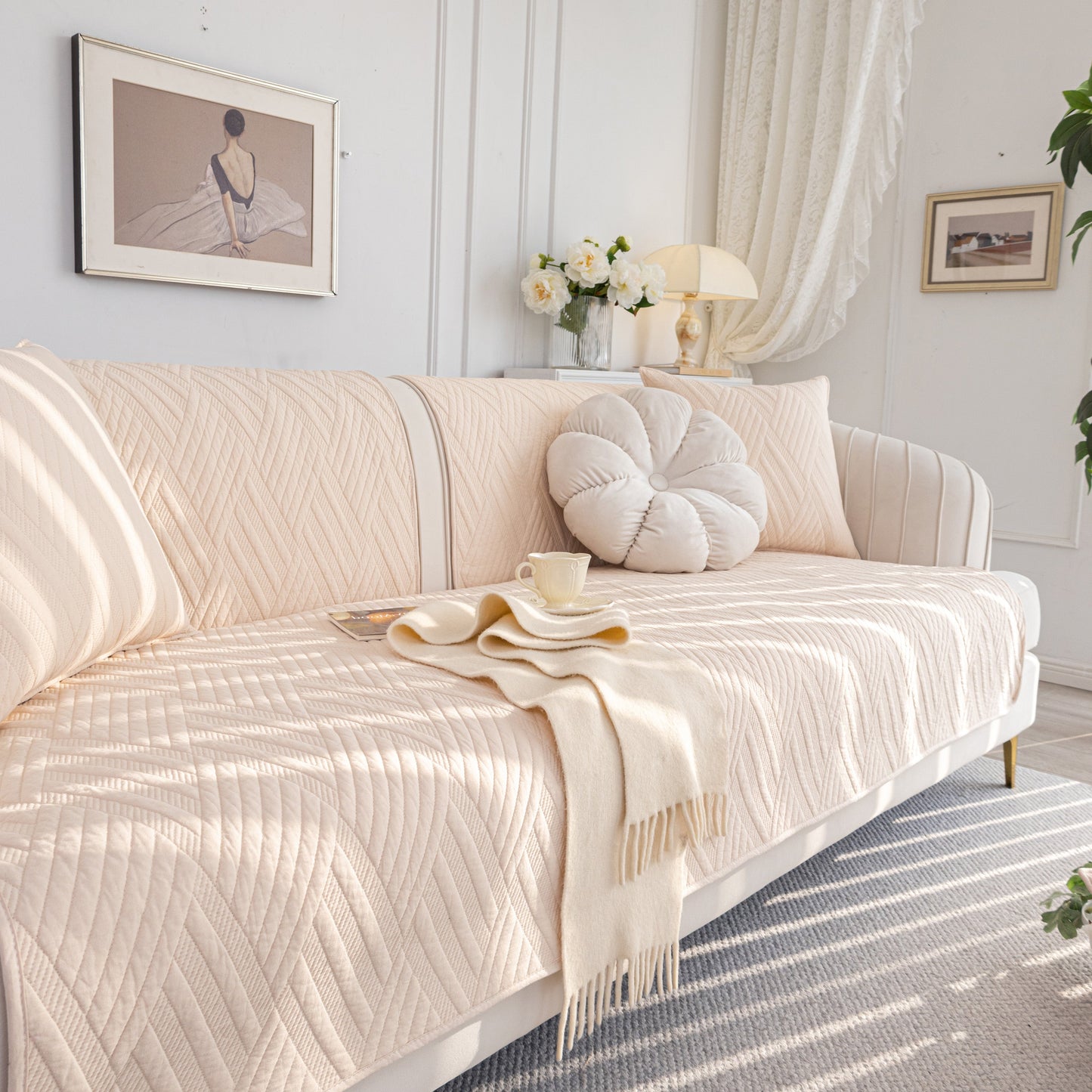 Quilted Geometric Cotton Sofa Cover, Non-Slip & Thick Padded Furniture Covers on elegant white sofa in bright room.