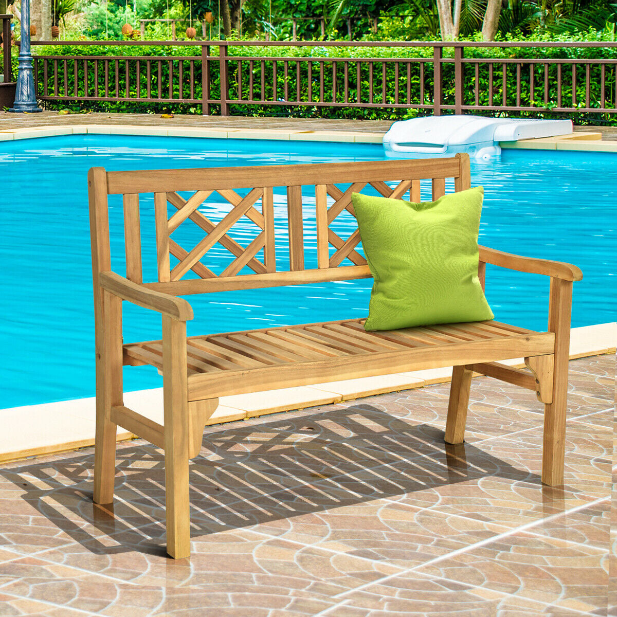 Patio Foldable Bench with Curved Backrest and Armrest by the poolside, featuring a decorative green cushion on a sunny day.