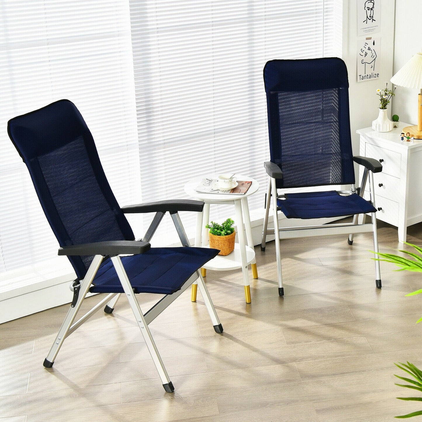 2Pcs Patio Dining Chair with Adjust Portable Headrest-Blue set up in a bright indoor space, featuring adjustable backrests, and comfortable armrests.