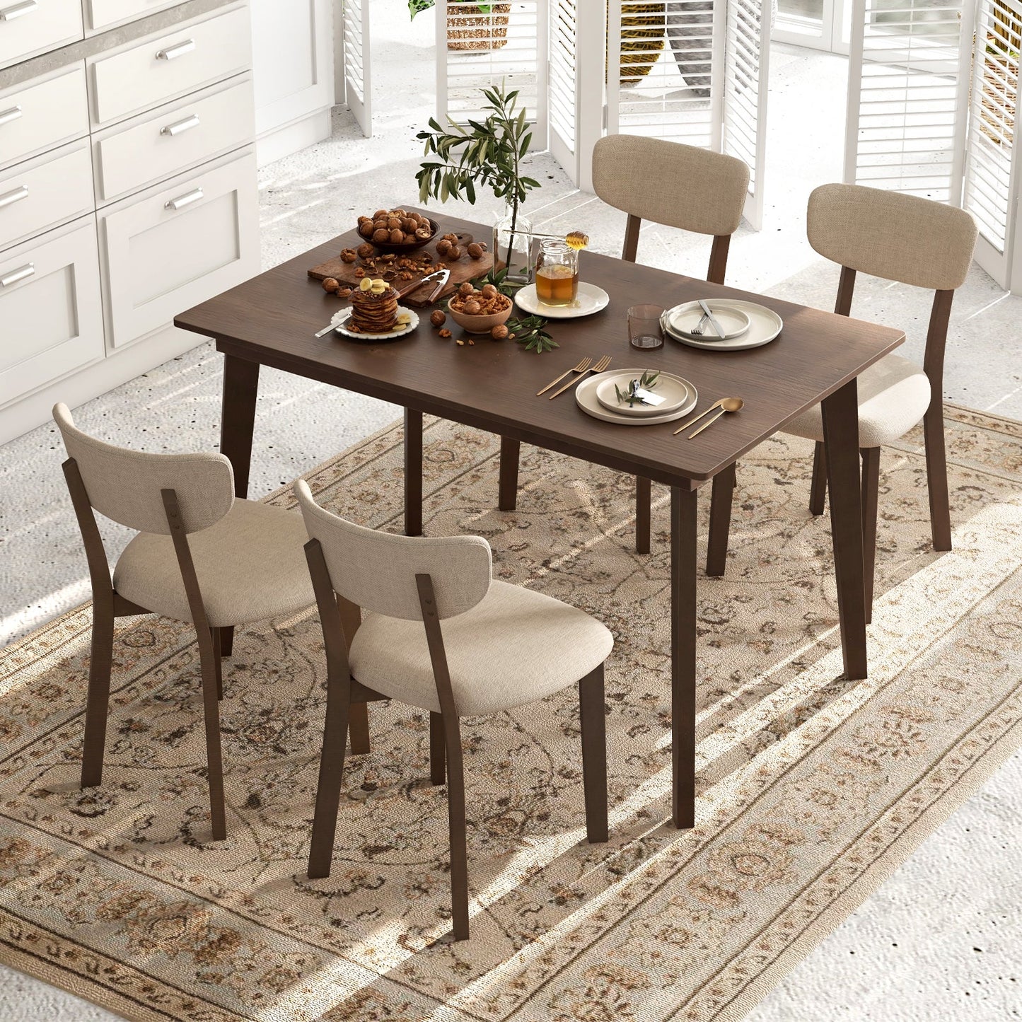 5-Piece Dining Table Set for 4 with Rubber Wood Frame and Padded Set-Brown in a dining room setting.