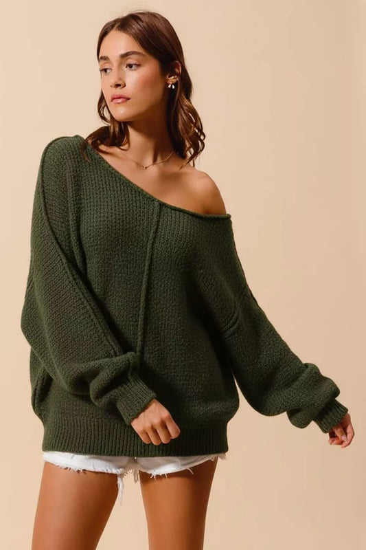 Model wearing SO ME Loose Fit Exposed Seam Slouchy Boucle Sweater in olive green