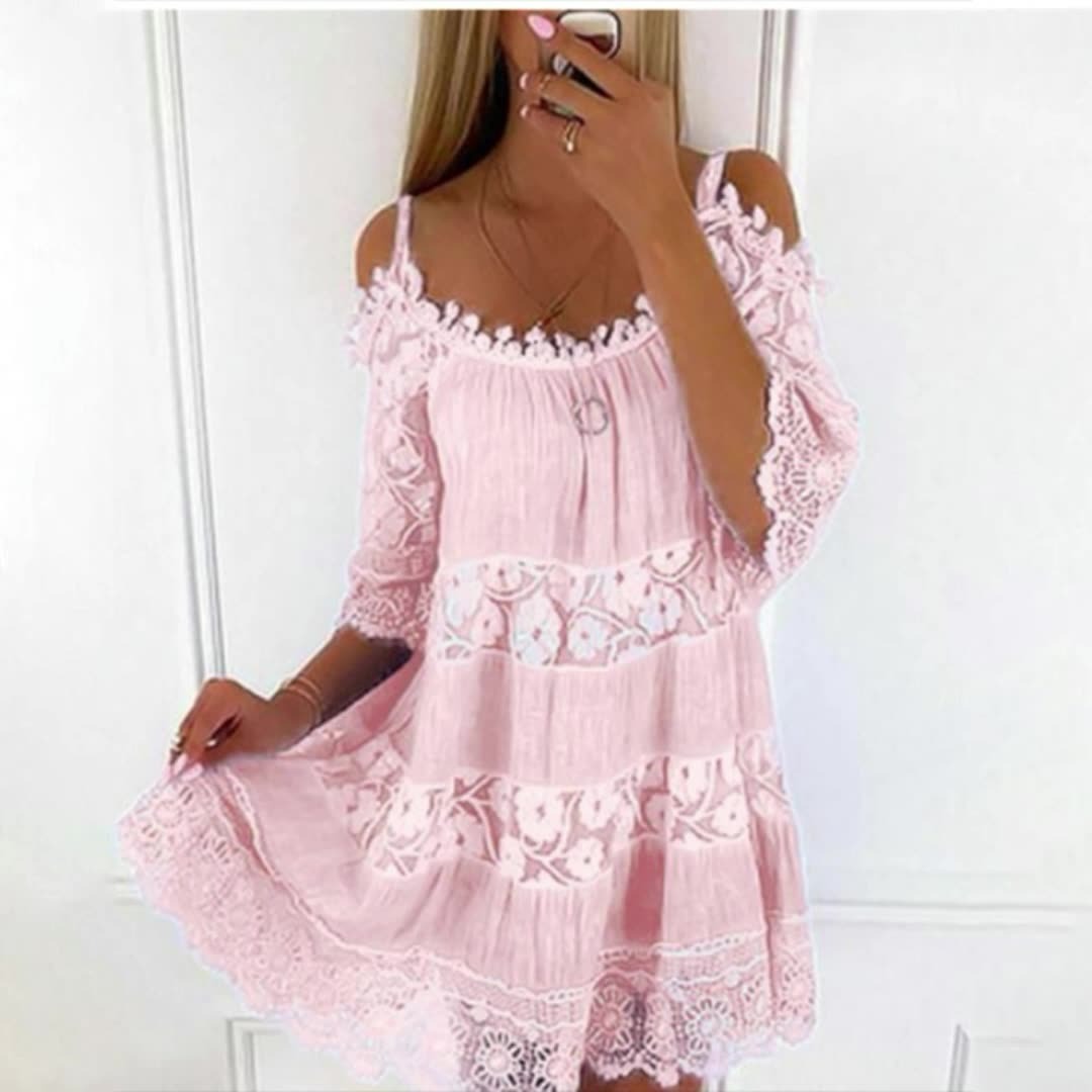Lace Embrace Summer Sling Dress with pink lace fabric, feminine silhouette, and romantic flowing sleeves, perfect for sunny days.